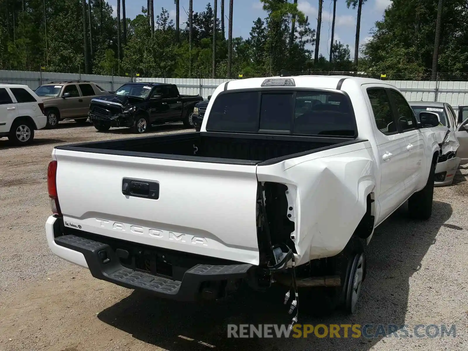 4 Photograph of a damaged car 5TFAX5GN8KX144551 TOYOTA TACOMA 2019