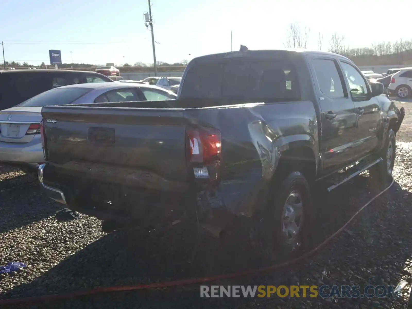 4 Photograph of a damaged car 5TFAX5GN8KX145585 TOYOTA TACOMA 2019