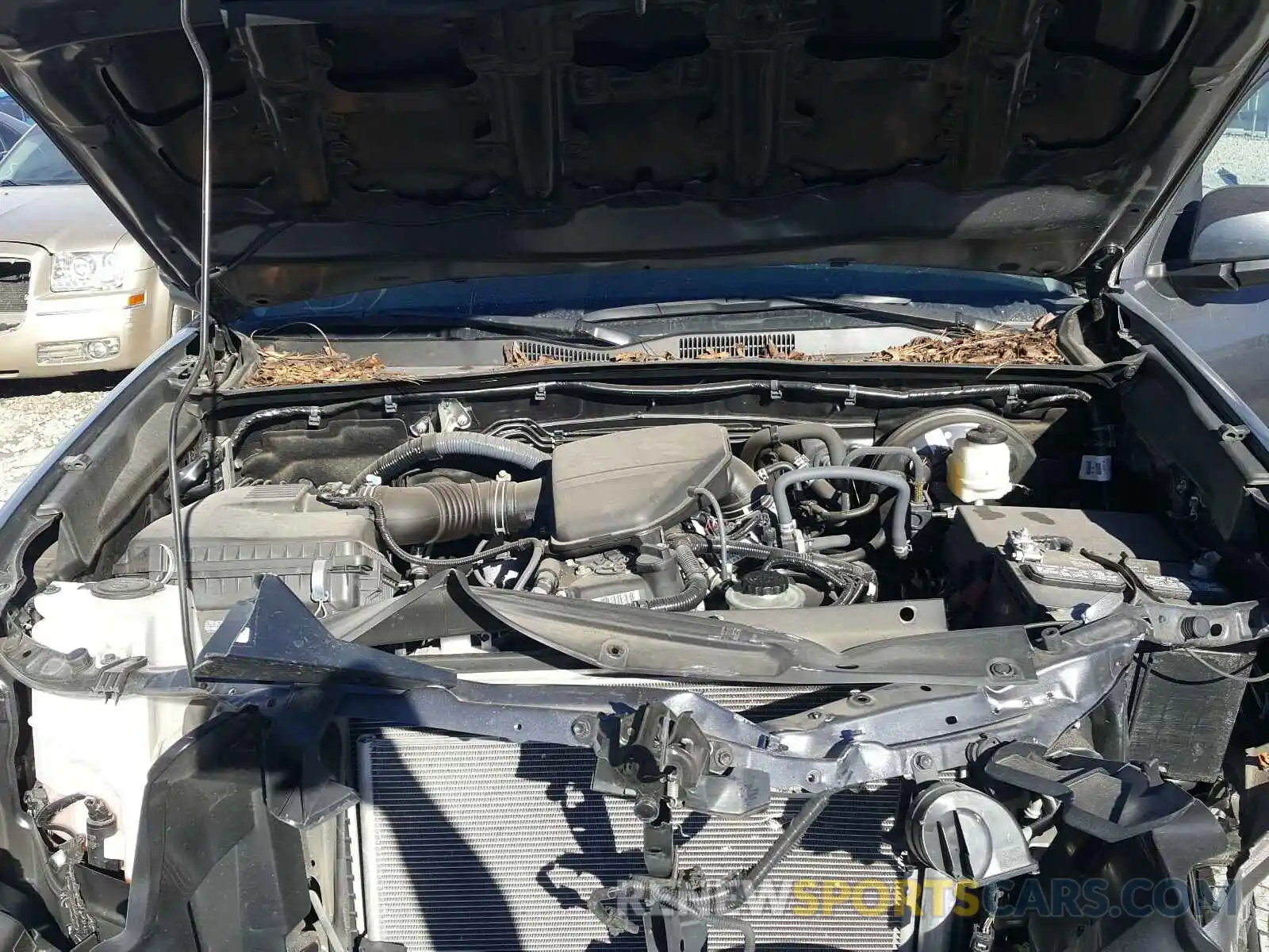 7 Photograph of a damaged car 5TFAX5GN8KX145585 TOYOTA TACOMA 2019