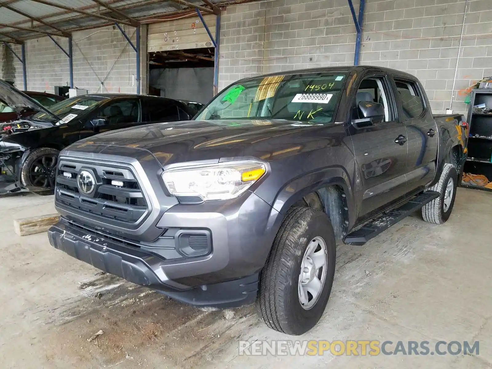 2 Photograph of a damaged car 5TFAX5GN8KX145781 TOYOTA TACOMA 2019