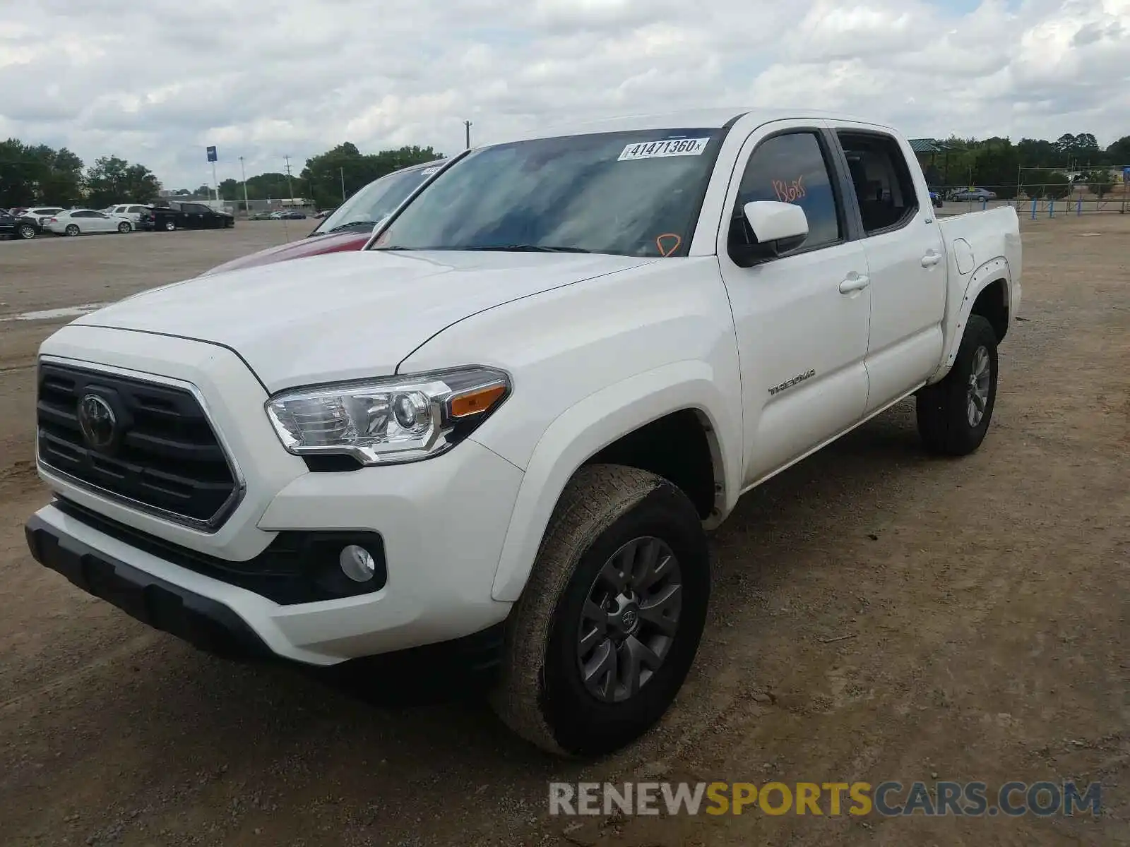 2 Photograph of a damaged car 5TFAX5GN8KX145957 TOYOTA TACOMA 2019