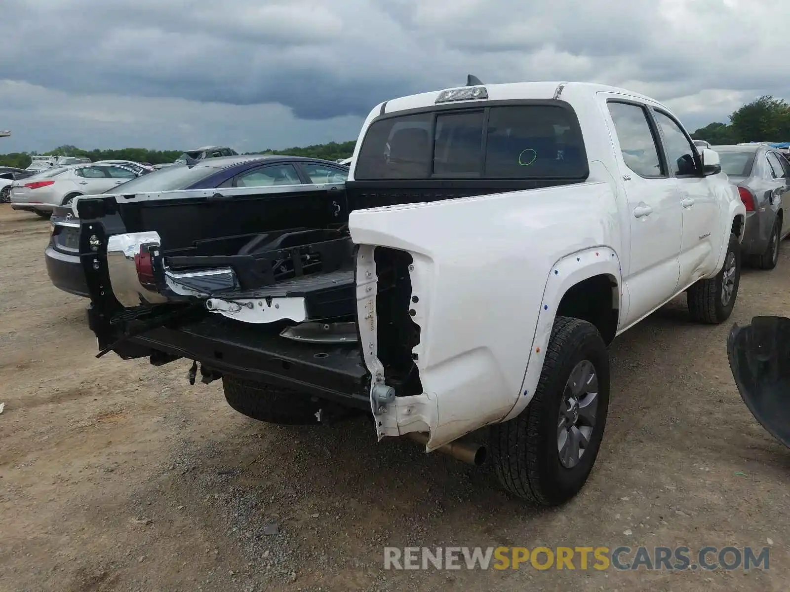 4 Photograph of a damaged car 5TFAX5GN8KX145957 TOYOTA TACOMA 2019