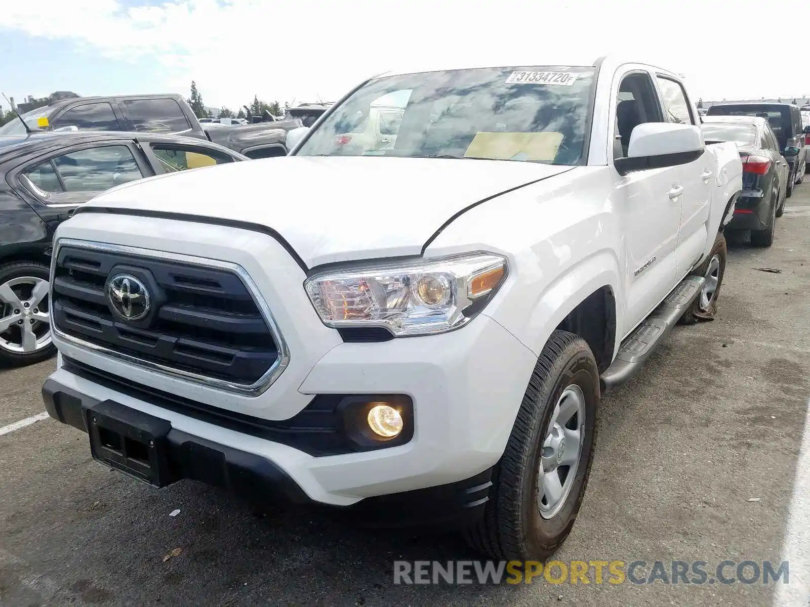 2 Photograph of a damaged car 5TFAX5GN8KX149684 TOYOTA TACOMA 2019