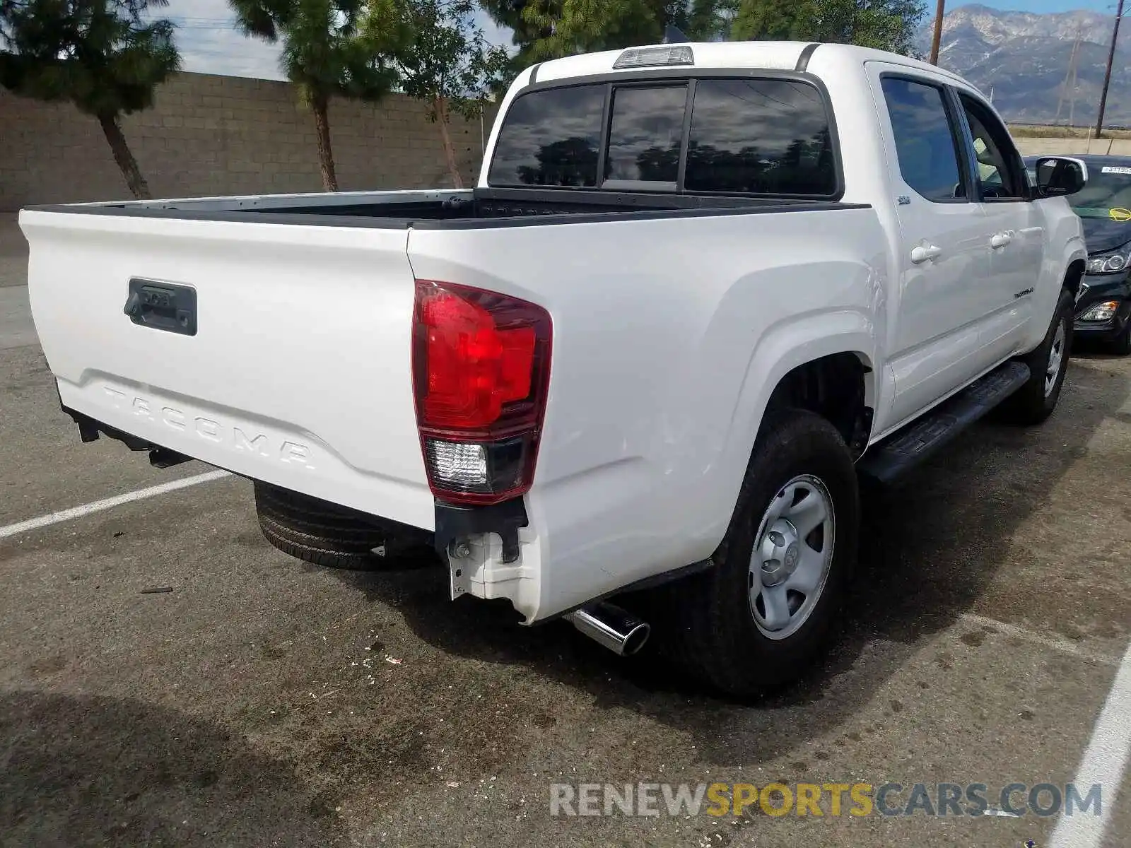 4 Photograph of a damaged car 5TFAX5GN8KX149684 TOYOTA TACOMA 2019