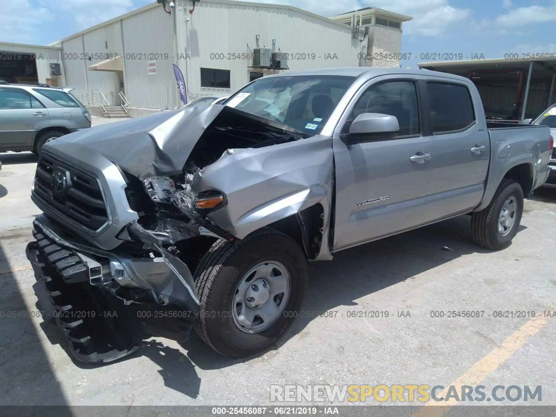 2 Photograph of a damaged car 5TFAX5GN8KX150320 TOYOTA TACOMA 2019