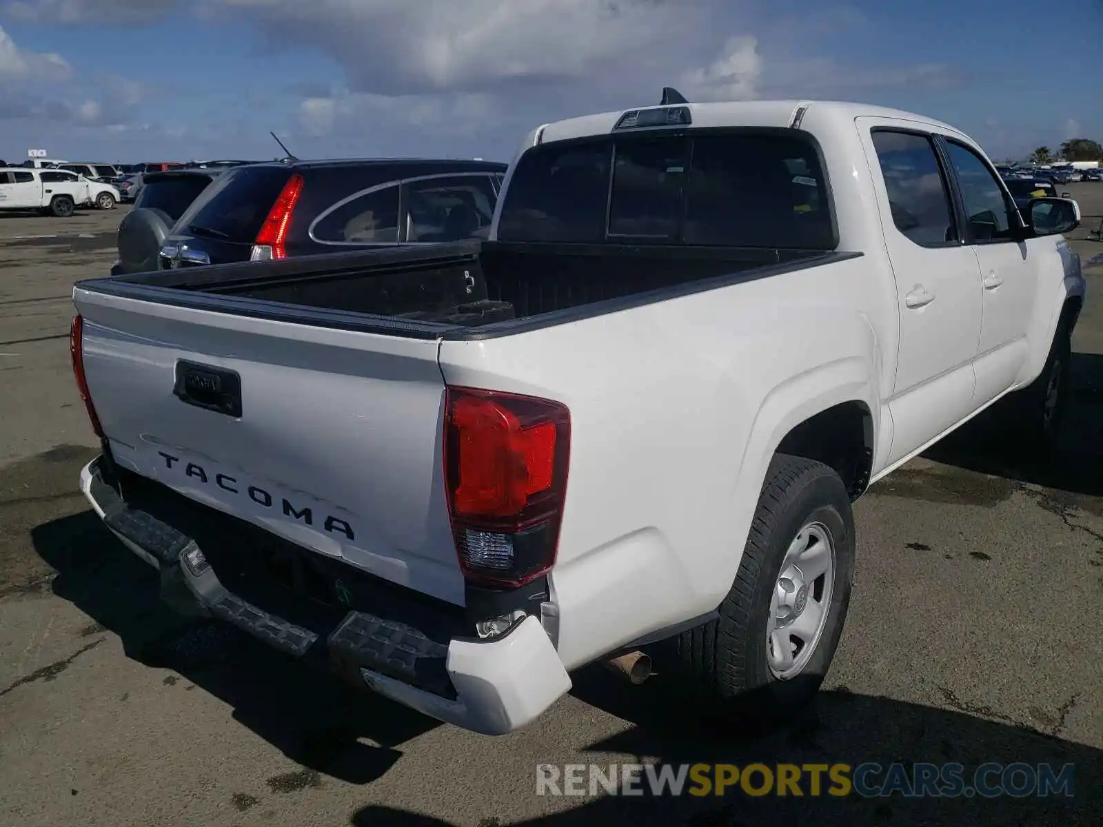 4 Photograph of a damaged car 5TFAX5GN8KX151502 TOYOTA TACOMA 2019