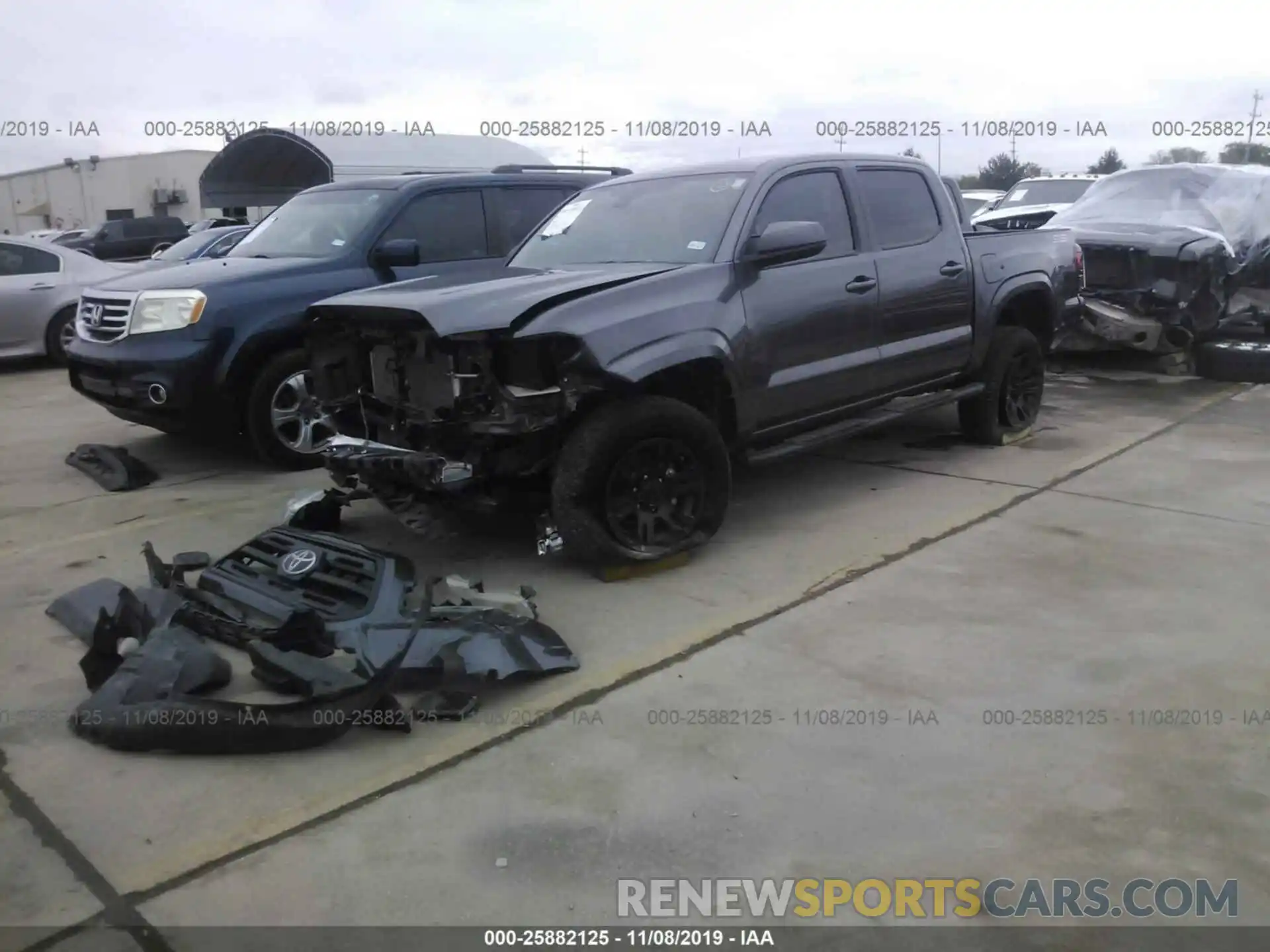 2 Photograph of a damaged car 5TFAX5GN8KX154710 TOYOTA TACOMA 2019