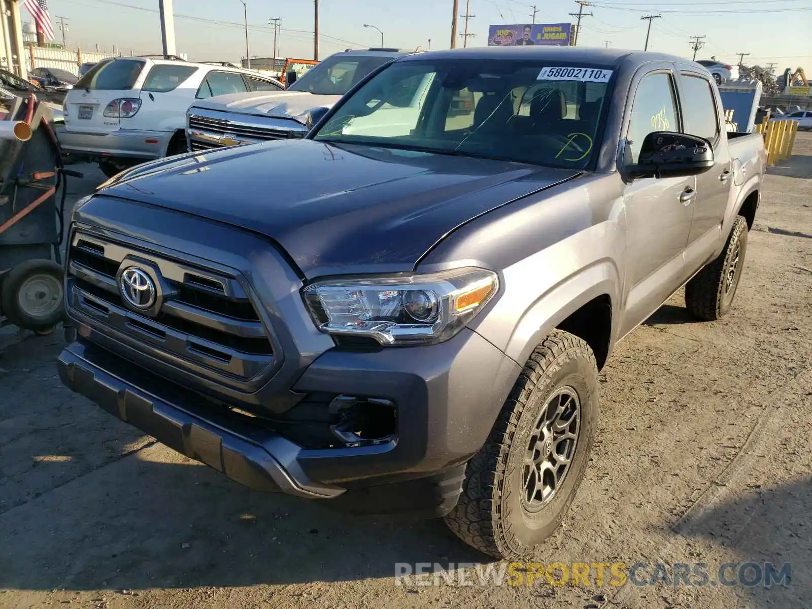 2 Photograph of a damaged car 5TFAX5GN8KX162113 TOYOTA TACOMA 2019