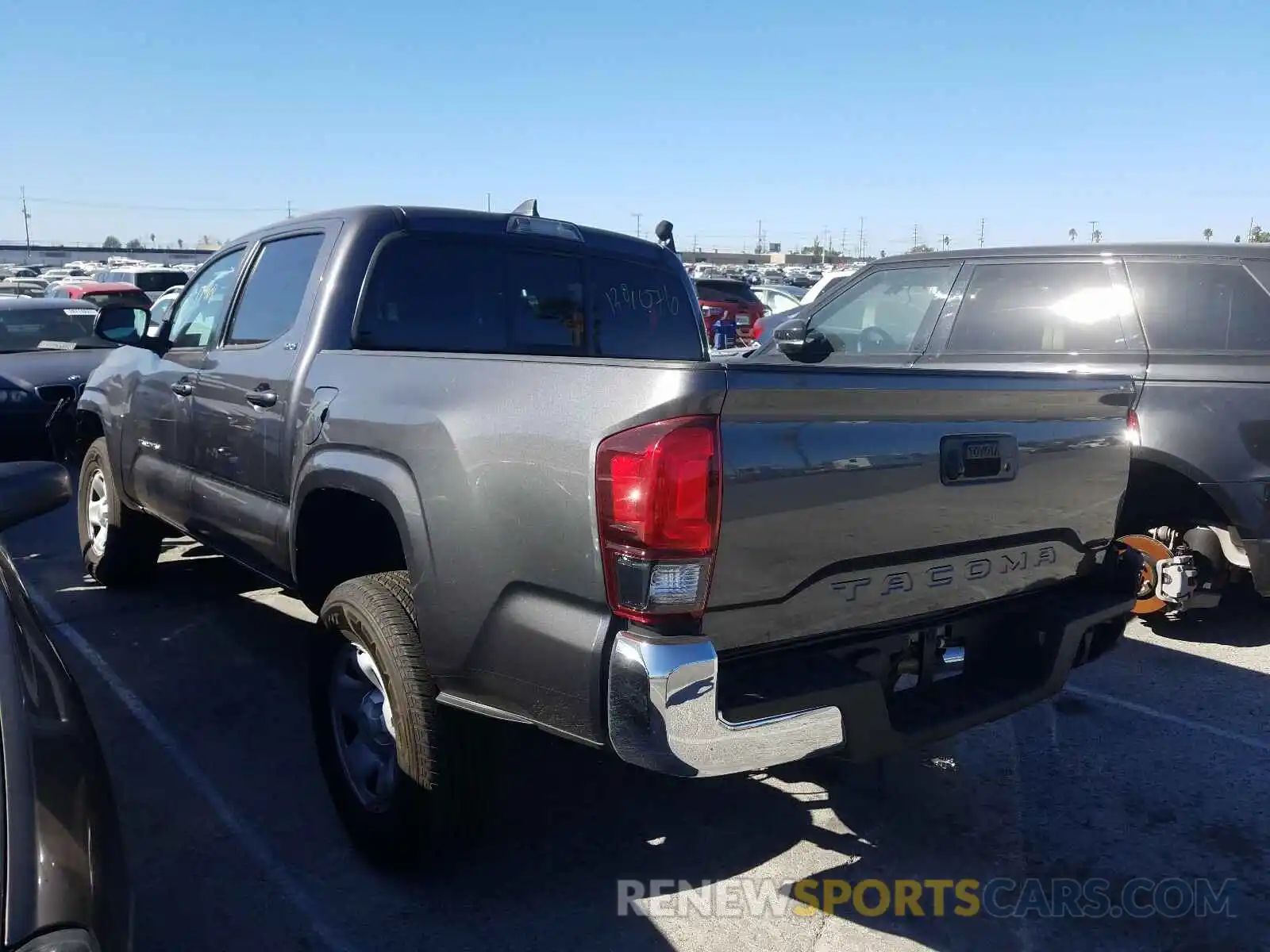 3 Photograph of a damaged car 5TFAX5GN8KX163925 TOYOTA TACOMA 2019