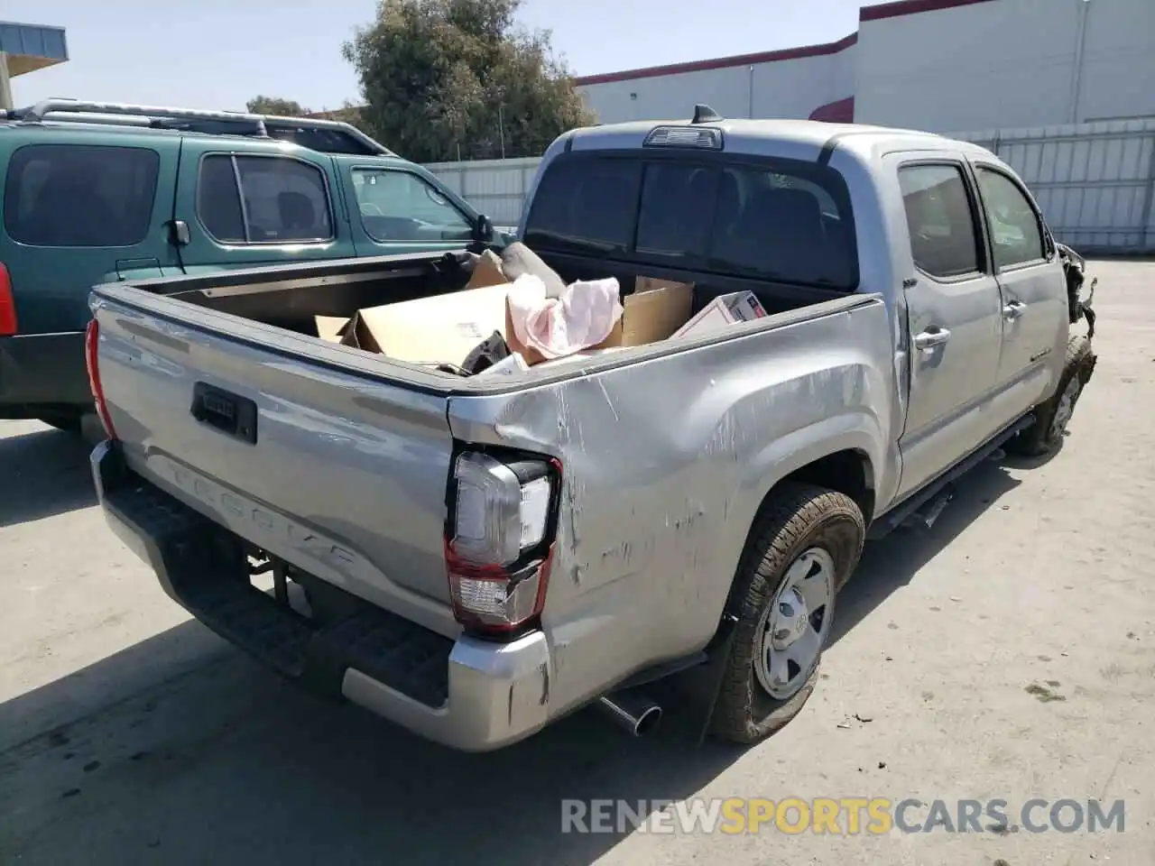 4 Photograph of a damaged car 5TFAX5GN8KX165190 TOYOTA TACOMA 2019