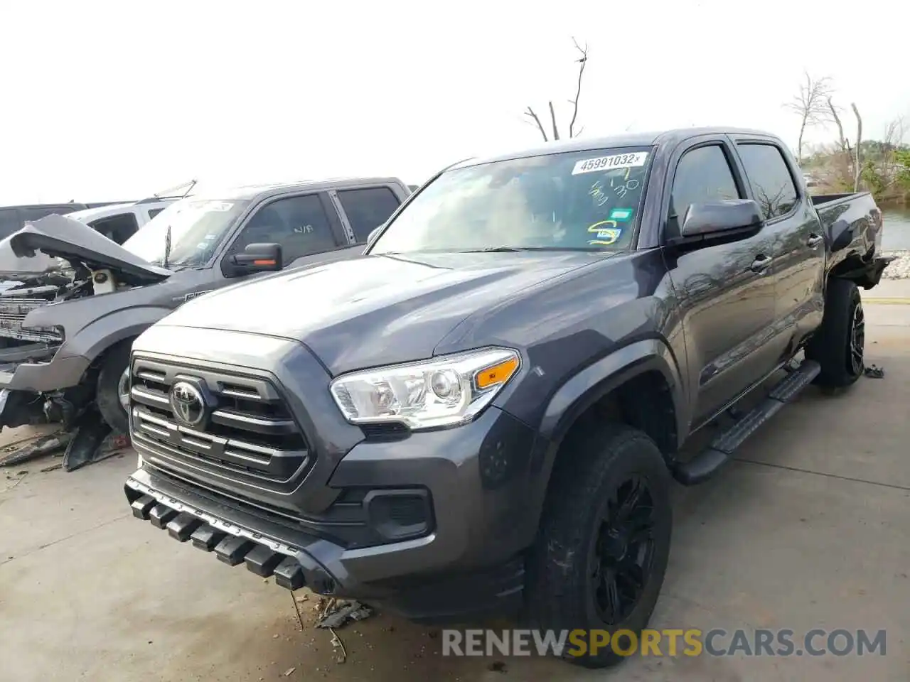 2 Photograph of a damaged car 5TFAX5GN9KX133770 TOYOTA TACOMA 2019