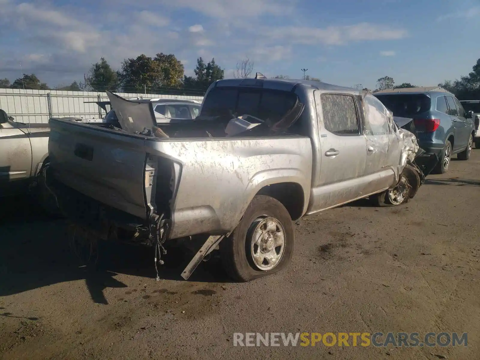 4 Photograph of a damaged car 5TFAX5GN9KX134143 TOYOTA TACOMA 2019