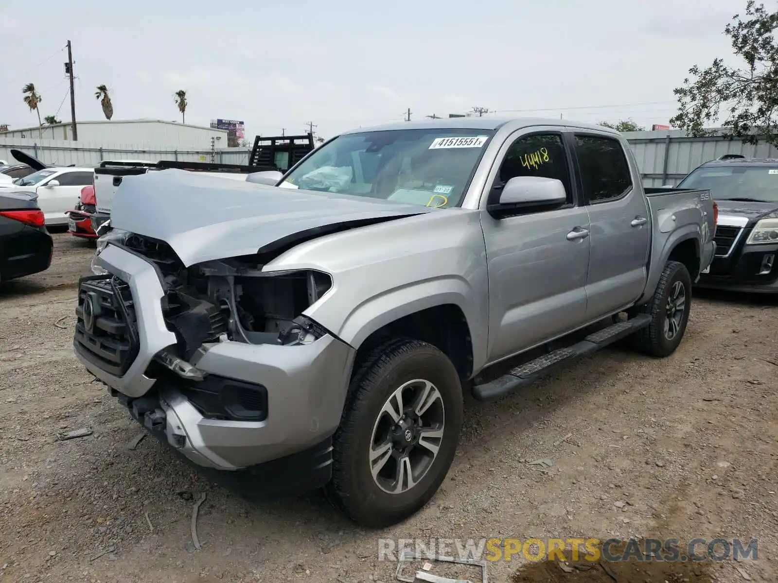 2 Photograph of a damaged car 5TFAX5GN9KX134868 TOYOTA TACOMA 2019