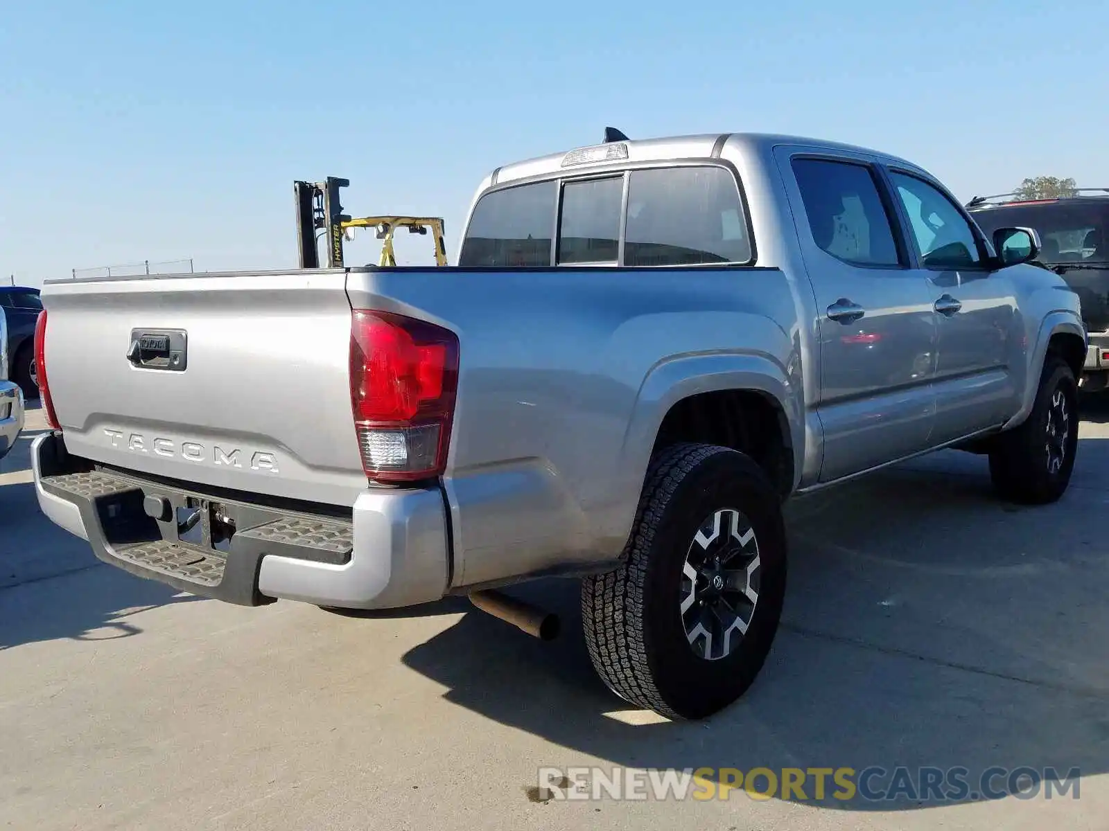 4 Photograph of a damaged car 5TFAX5GN9KX135261 TOYOTA TACOMA 2019