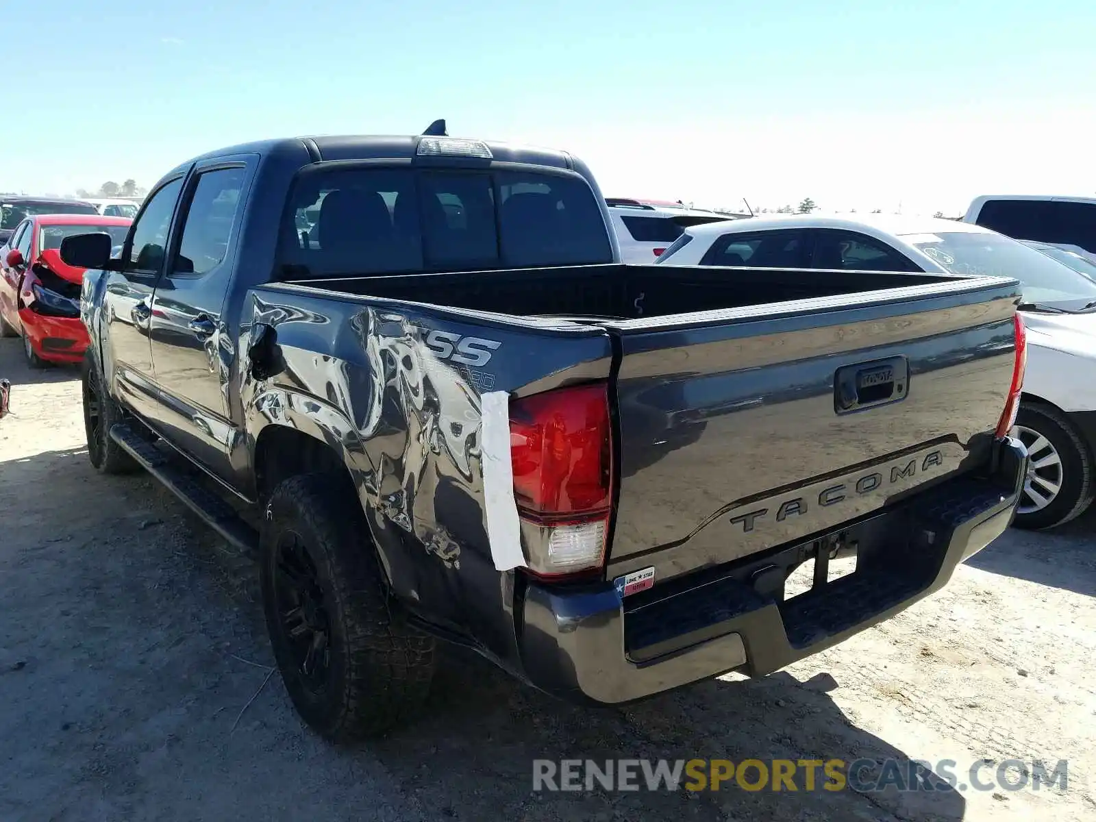 3 Photograph of a damaged car 5TFAX5GN9KX135888 TOYOTA TACOMA 2019