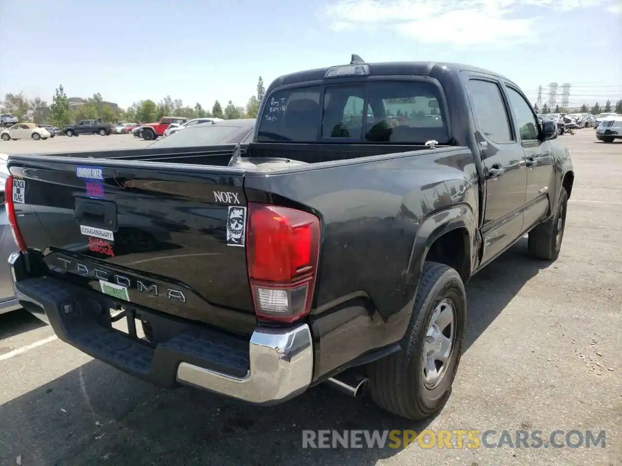 4 Photograph of a damaged car 5TFAX5GN9KX136751 TOYOTA TACOMA 2019