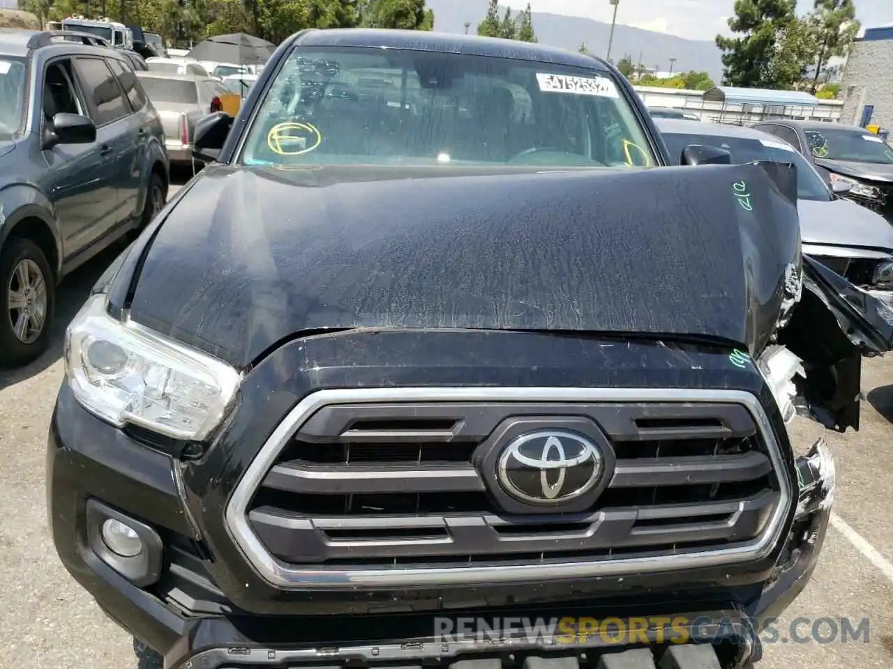 7 Photograph of a damaged car 5TFAX5GN9KX136751 TOYOTA TACOMA 2019