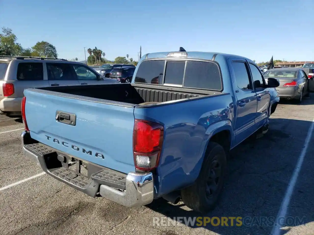 4 Photograph of a damaged car 5TFAX5GN9KX136894 TOYOTA TACOMA 2019