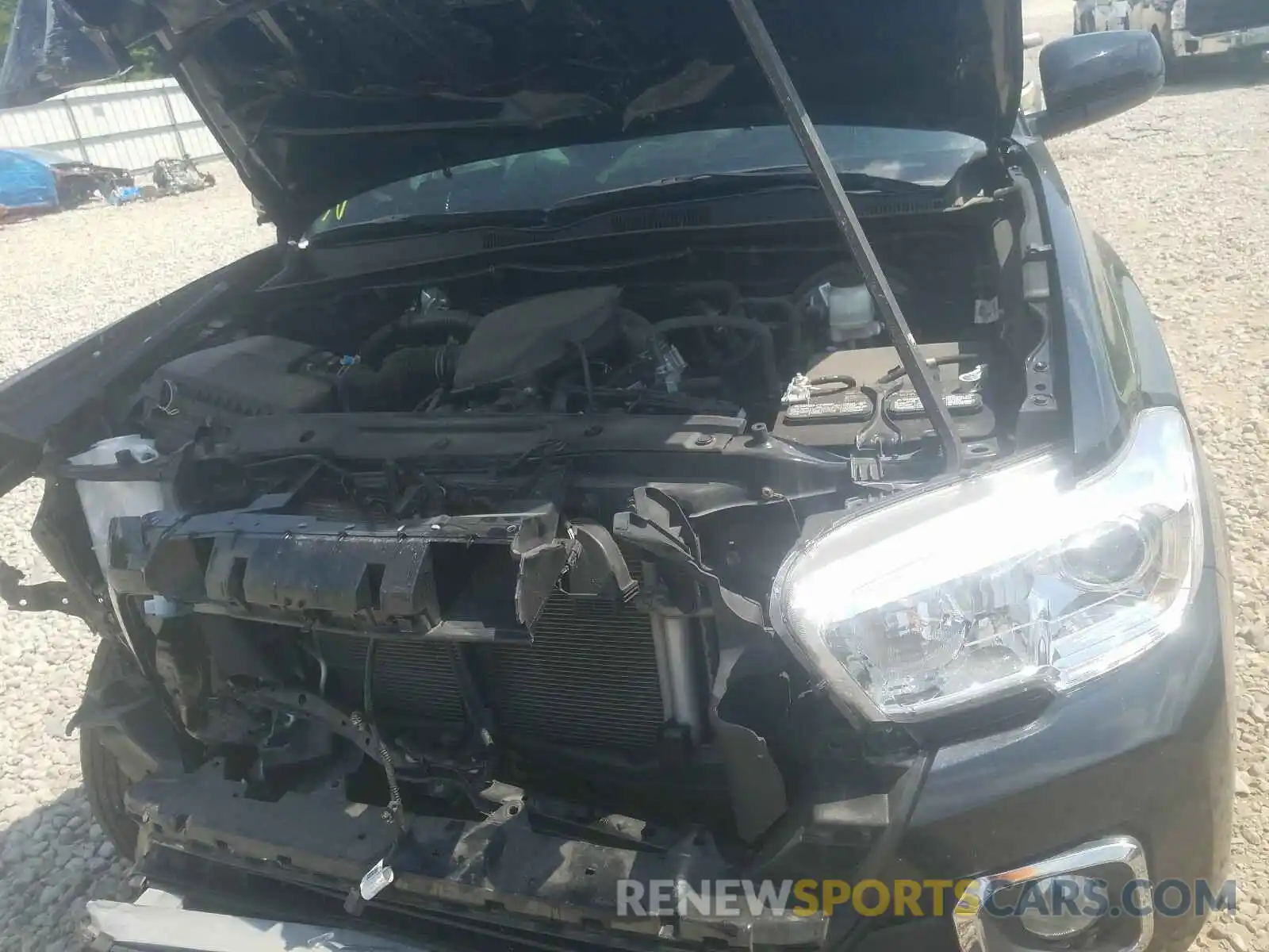 7 Photograph of a damaged car 5TFAX5GN9KX138015 TOYOTA TACOMA 2019