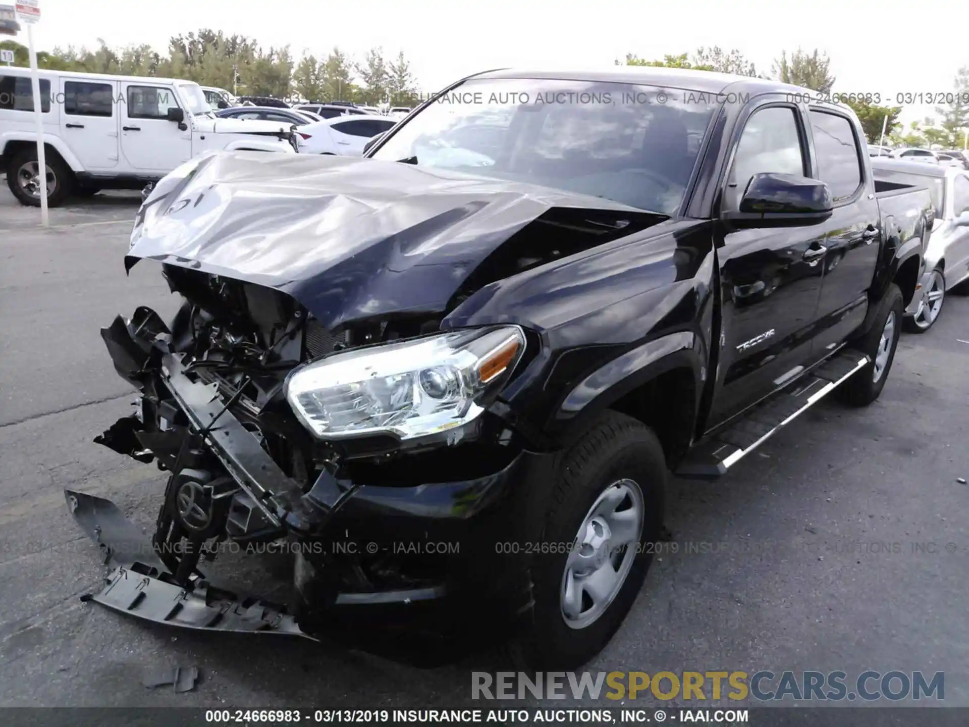 2 Photograph of a damaged car 5TFAX5GN9KX138273 TOYOTA TACOMA 2019