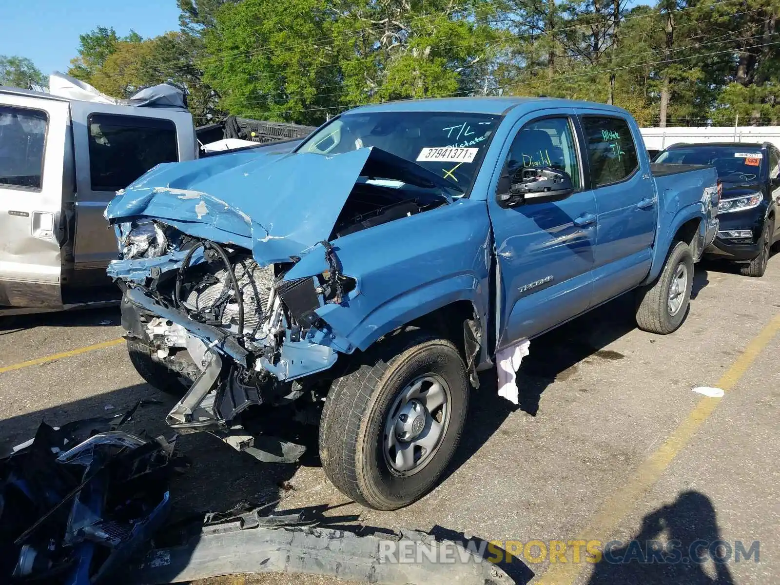 2 Photograph of a damaged car 5TFAX5GN9KX143098 TOYOTA TACOMA 2019