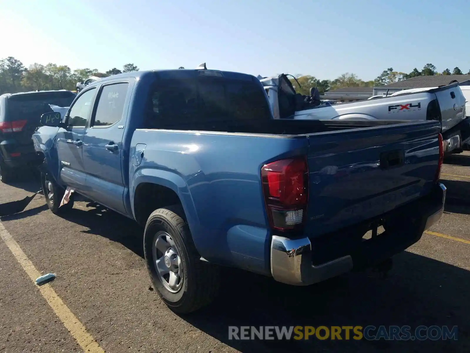 3 Photograph of a damaged car 5TFAX5GN9KX143098 TOYOTA TACOMA 2019