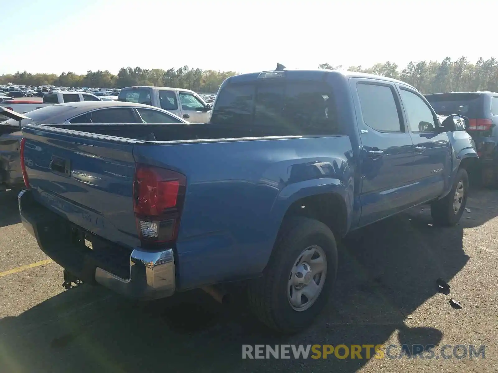 4 Photograph of a damaged car 5TFAX5GN9KX143098 TOYOTA TACOMA 2019