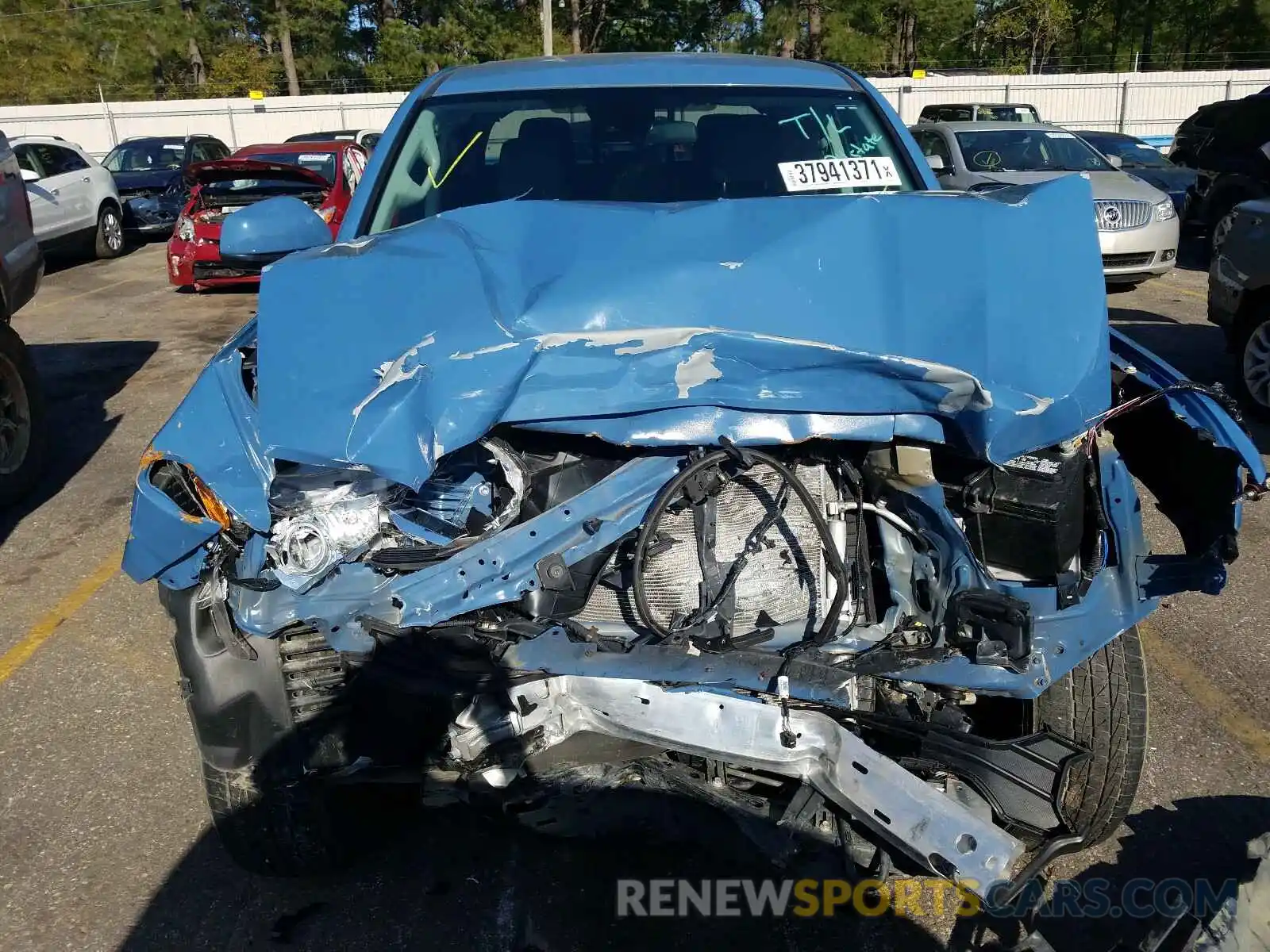 9 Photograph of a damaged car 5TFAX5GN9KX143098 TOYOTA TACOMA 2019