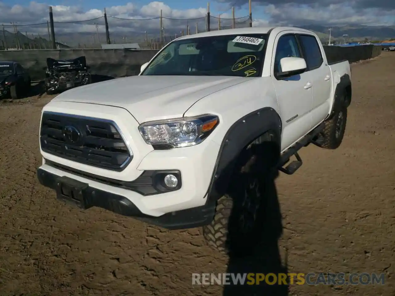 2 Photograph of a damaged car 5TFAX5GN9KX143828 TOYOTA TACOMA 2019