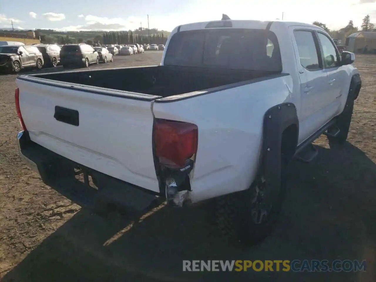 4 Photograph of a damaged car 5TFAX5GN9KX143828 TOYOTA TACOMA 2019