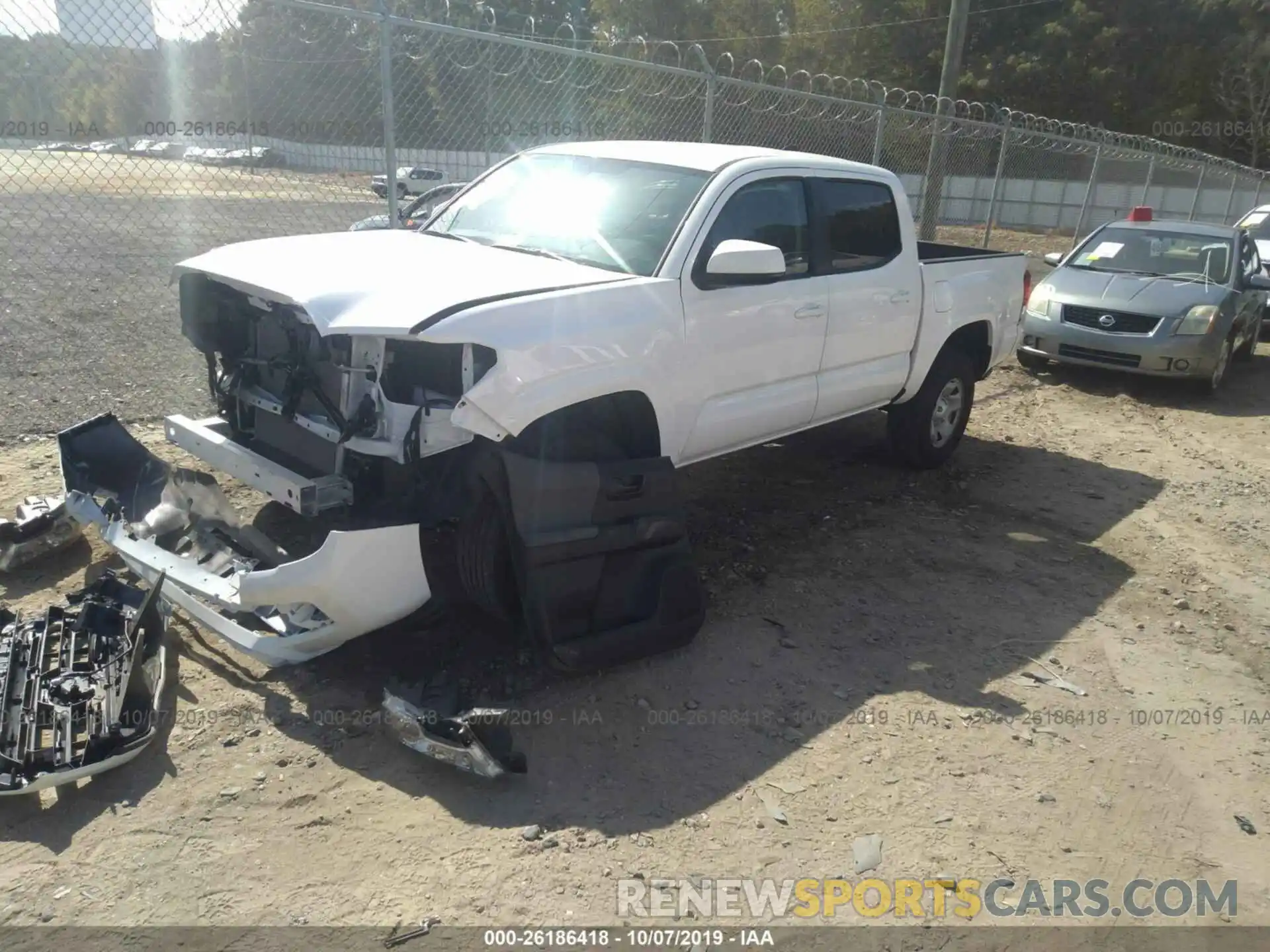 2 Photograph of a damaged car 5TFAX5GN9KX144462 TOYOTA TACOMA 2019