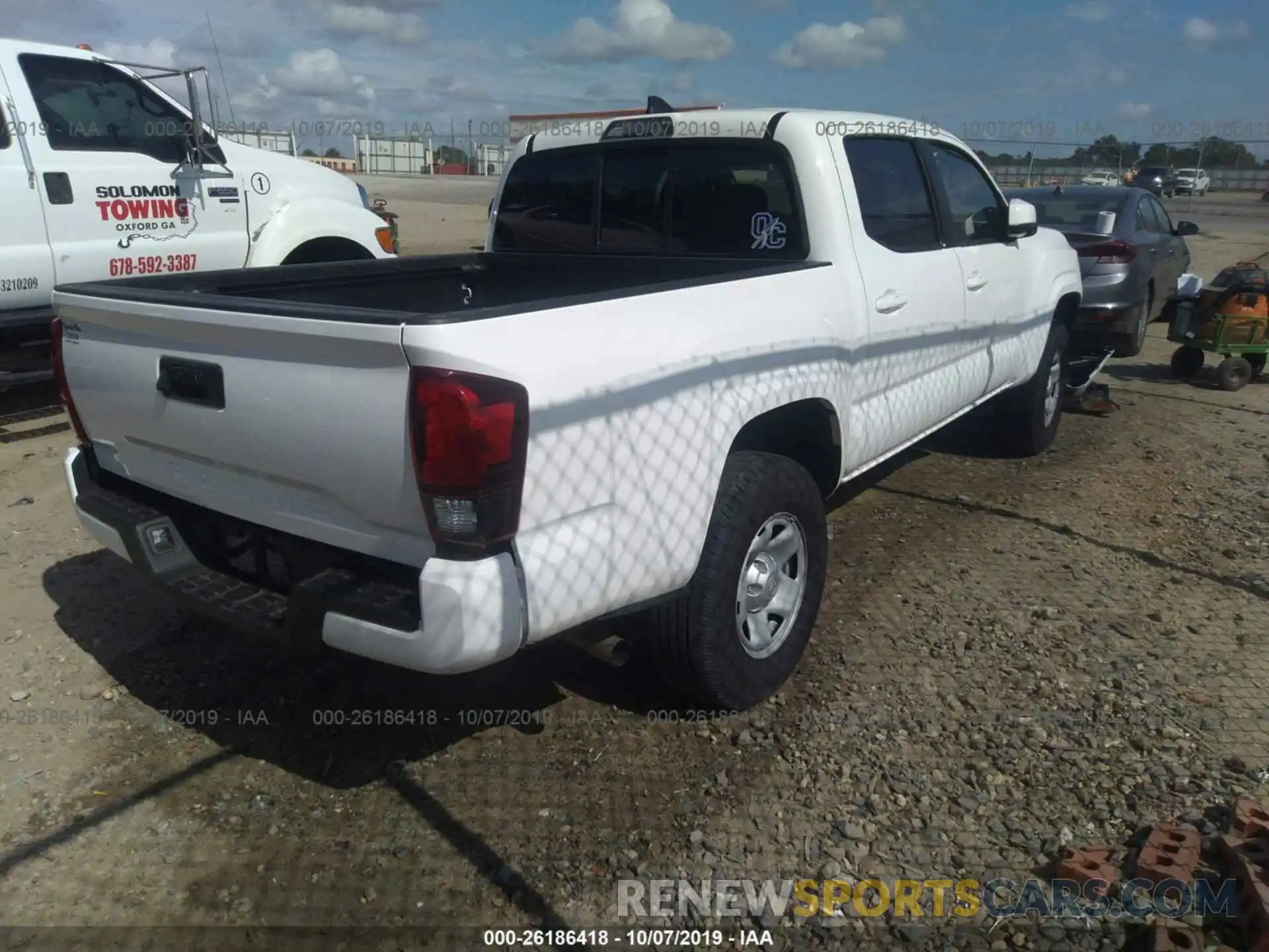 4 Photograph of a damaged car 5TFAX5GN9KX144462 TOYOTA TACOMA 2019