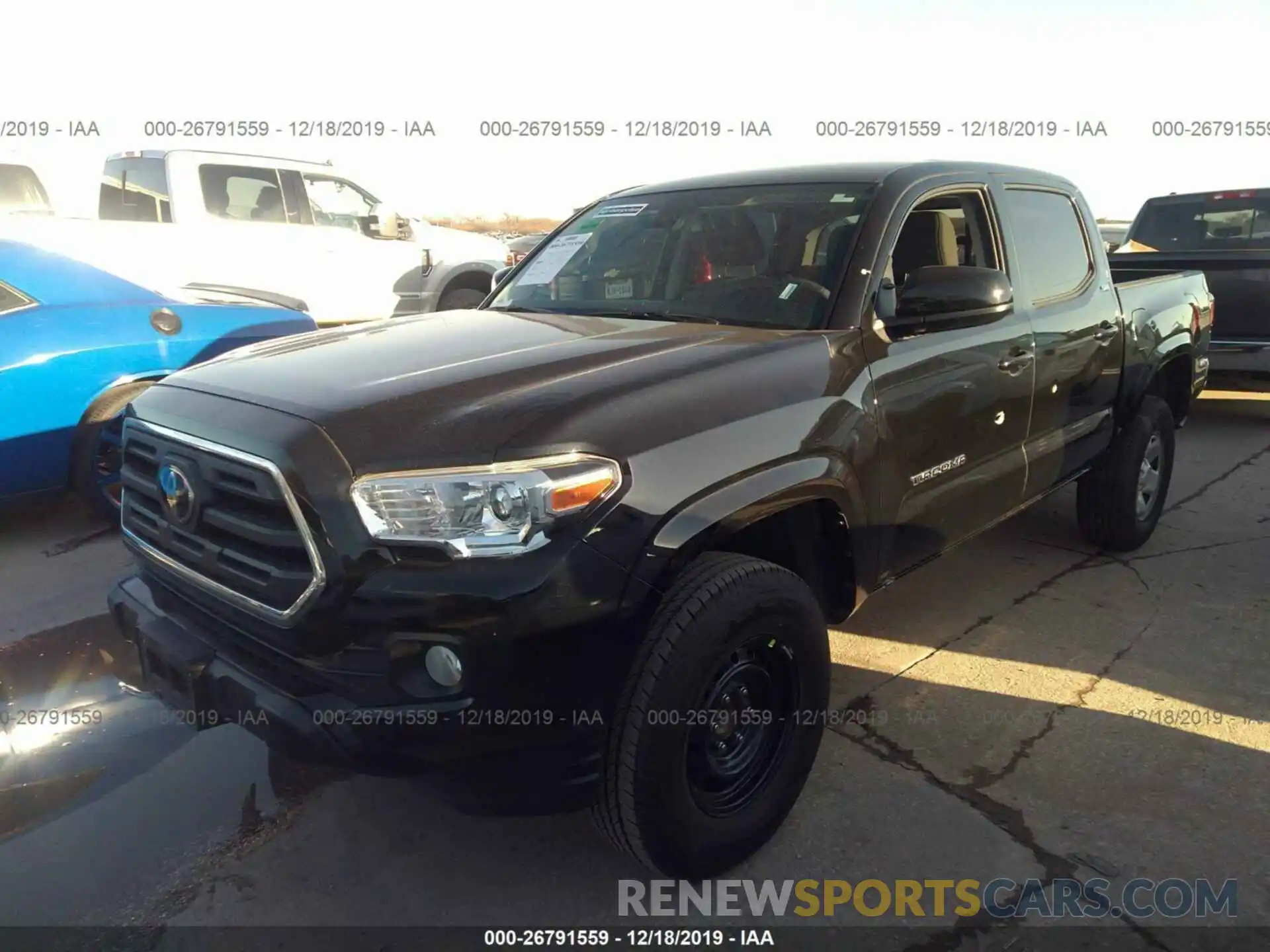 2 Photograph of a damaged car 5TFAX5GN9KX146034 TOYOTA TACOMA 2019