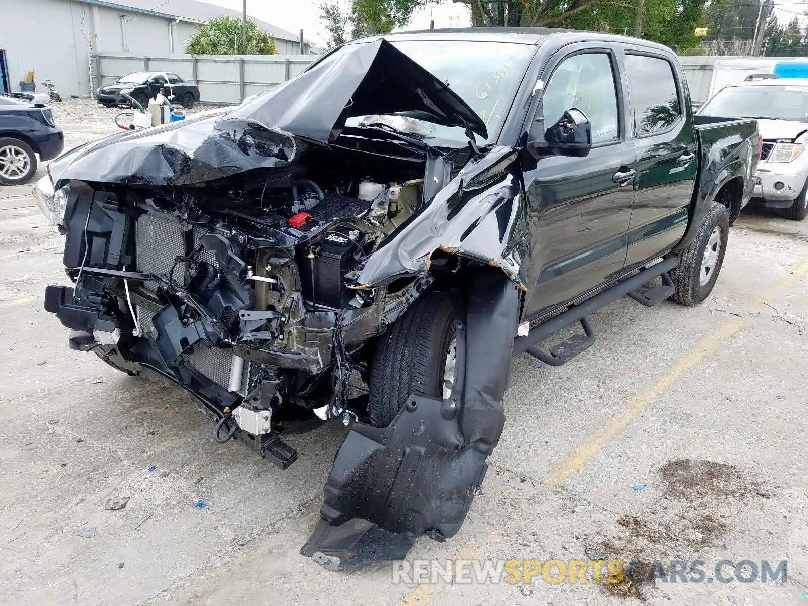 2 Photograph of a damaged car 5TFAX5GN9KX146390 TOYOTA TACOMA 2019