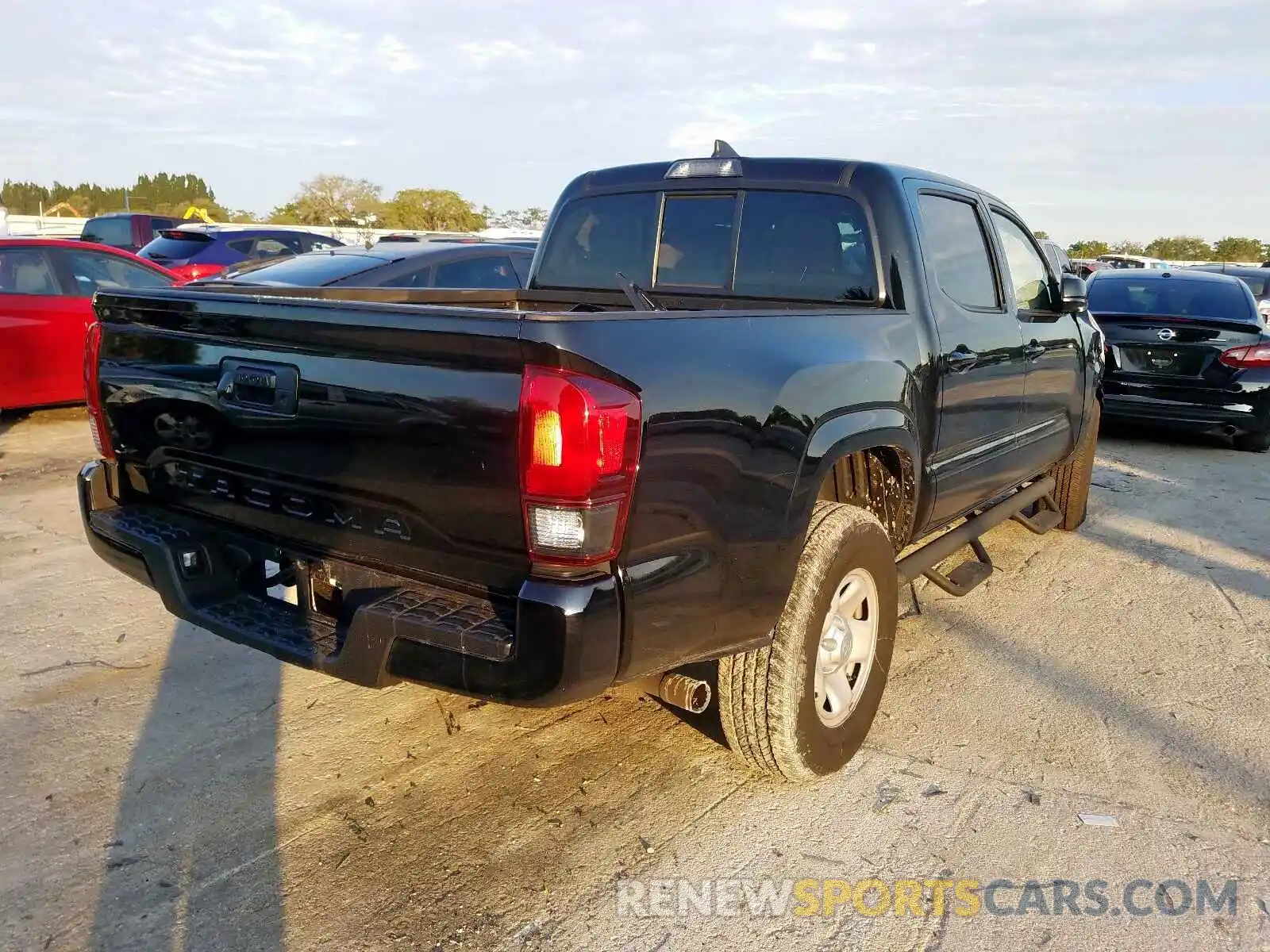 4 Photograph of a damaged car 5TFAX5GN9KX146390 TOYOTA TACOMA 2019