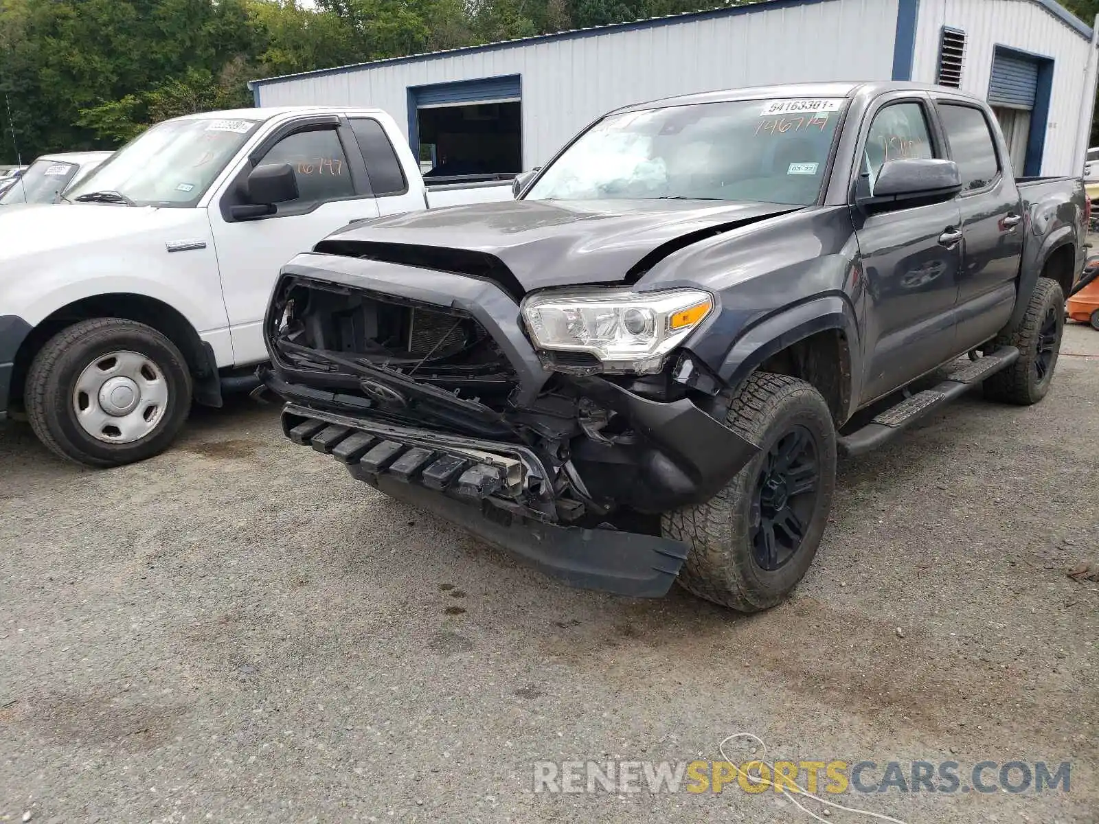 2 Photograph of a damaged car 5TFAX5GN9KX146714 TOYOTA TACOMA 2019