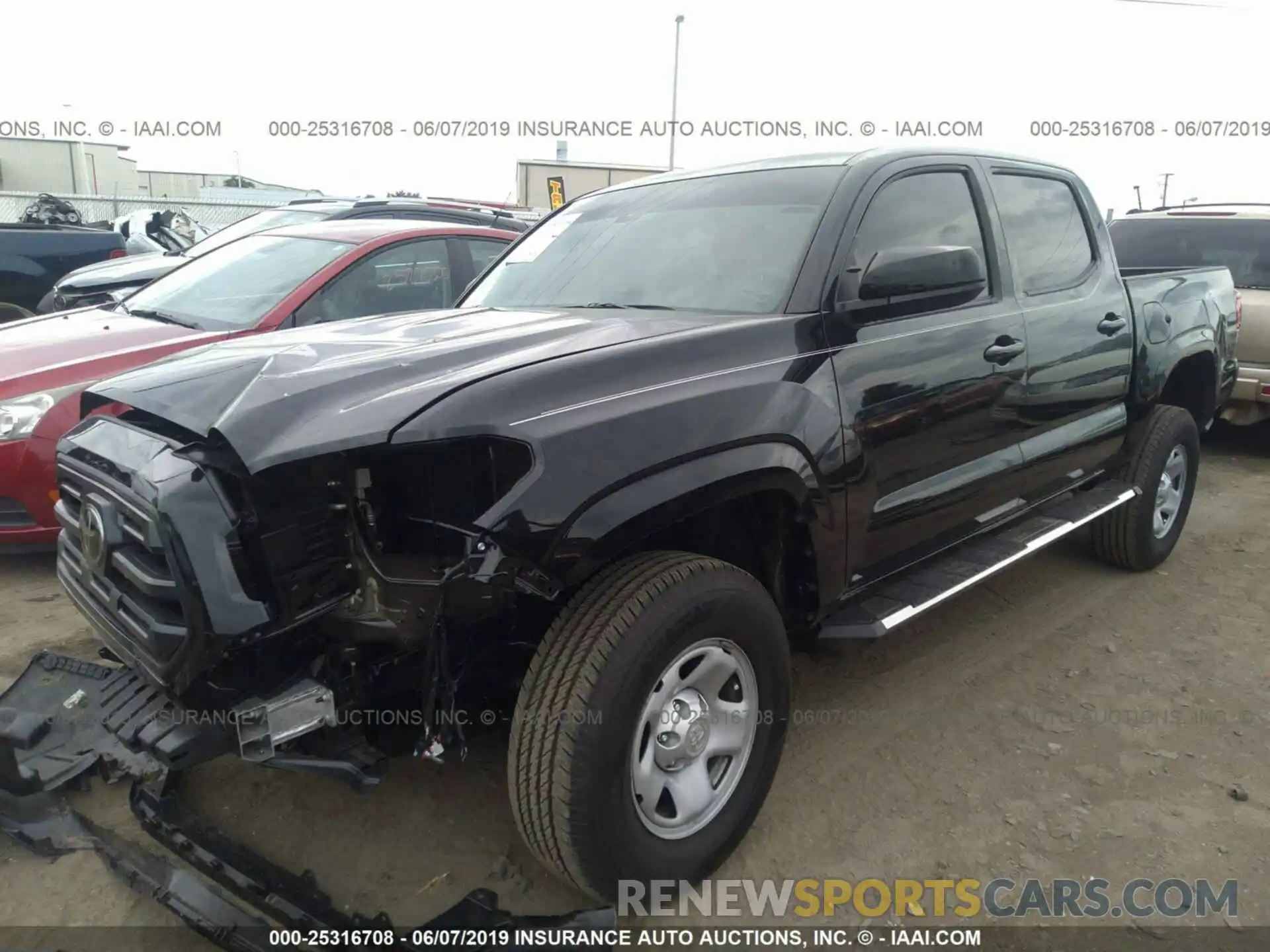 2 Photograph of a damaged car 5TFAX5GN9KX146924 TOYOTA TACOMA 2019