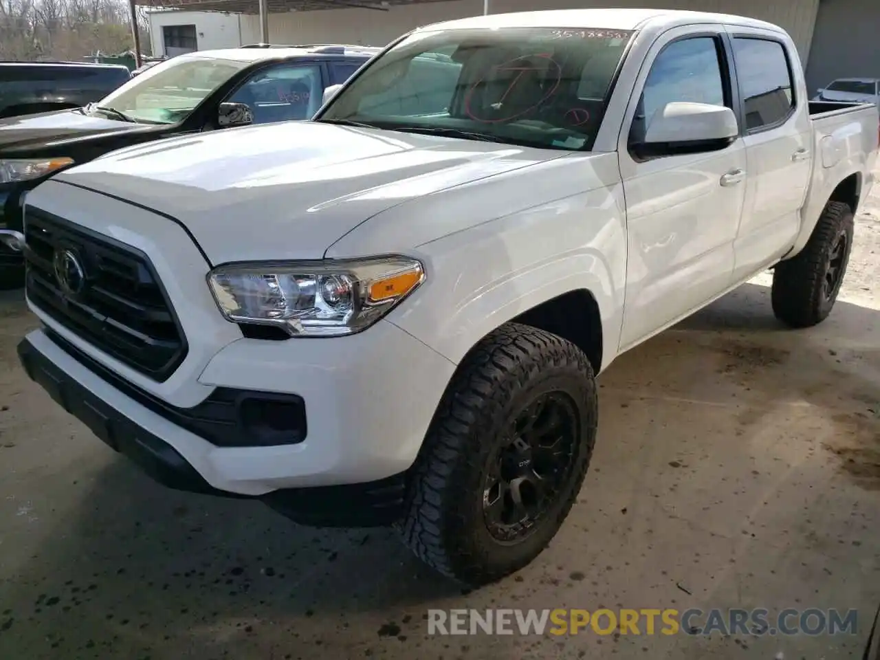 2 Photograph of a damaged car 5TFAX5GN9KX147278 TOYOTA TACOMA 2019