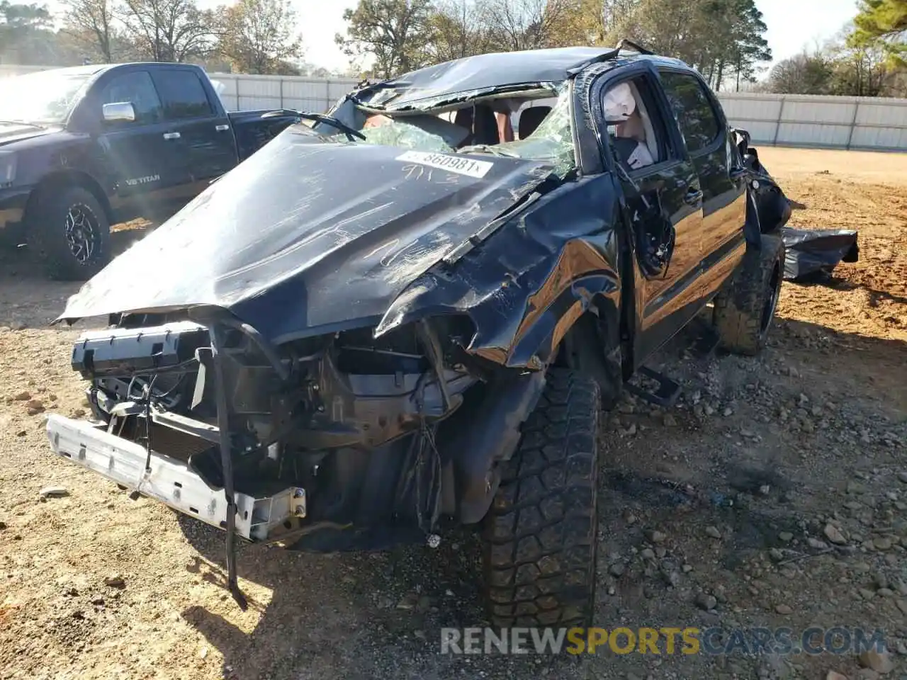 2 Photograph of a damaged car 5TFAX5GN9KX149113 TOYOTA TACOMA 2019