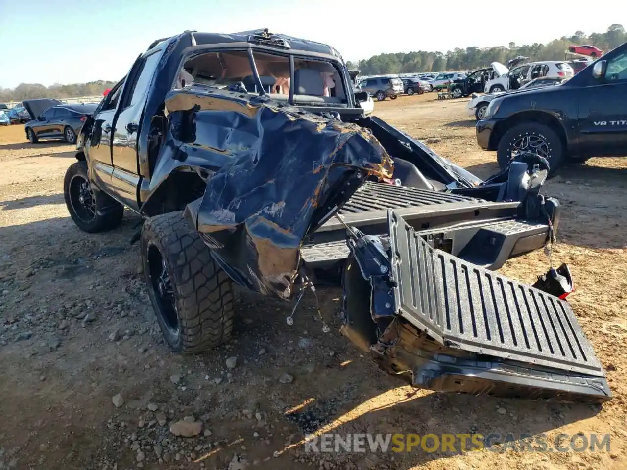 3 Photograph of a damaged car 5TFAX5GN9KX149113 TOYOTA TACOMA 2019