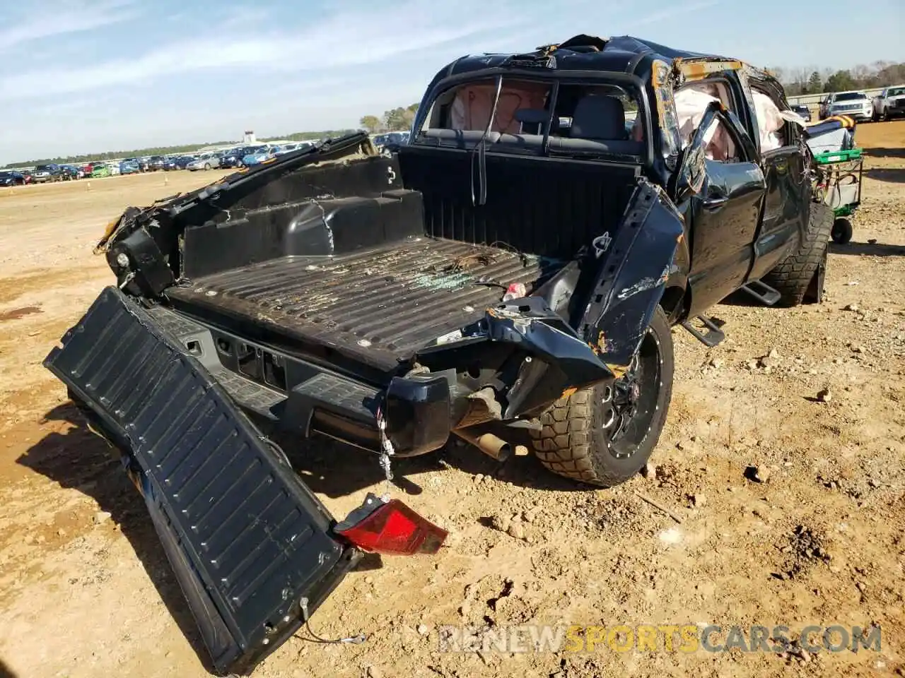 4 Photograph of a damaged car 5TFAX5GN9KX149113 TOYOTA TACOMA 2019