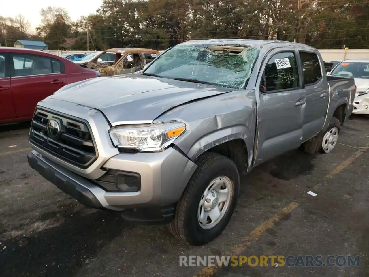 2 Photograph of a damaged car 5TFAX5GN9KX157793 TOYOTA TACOMA 2019