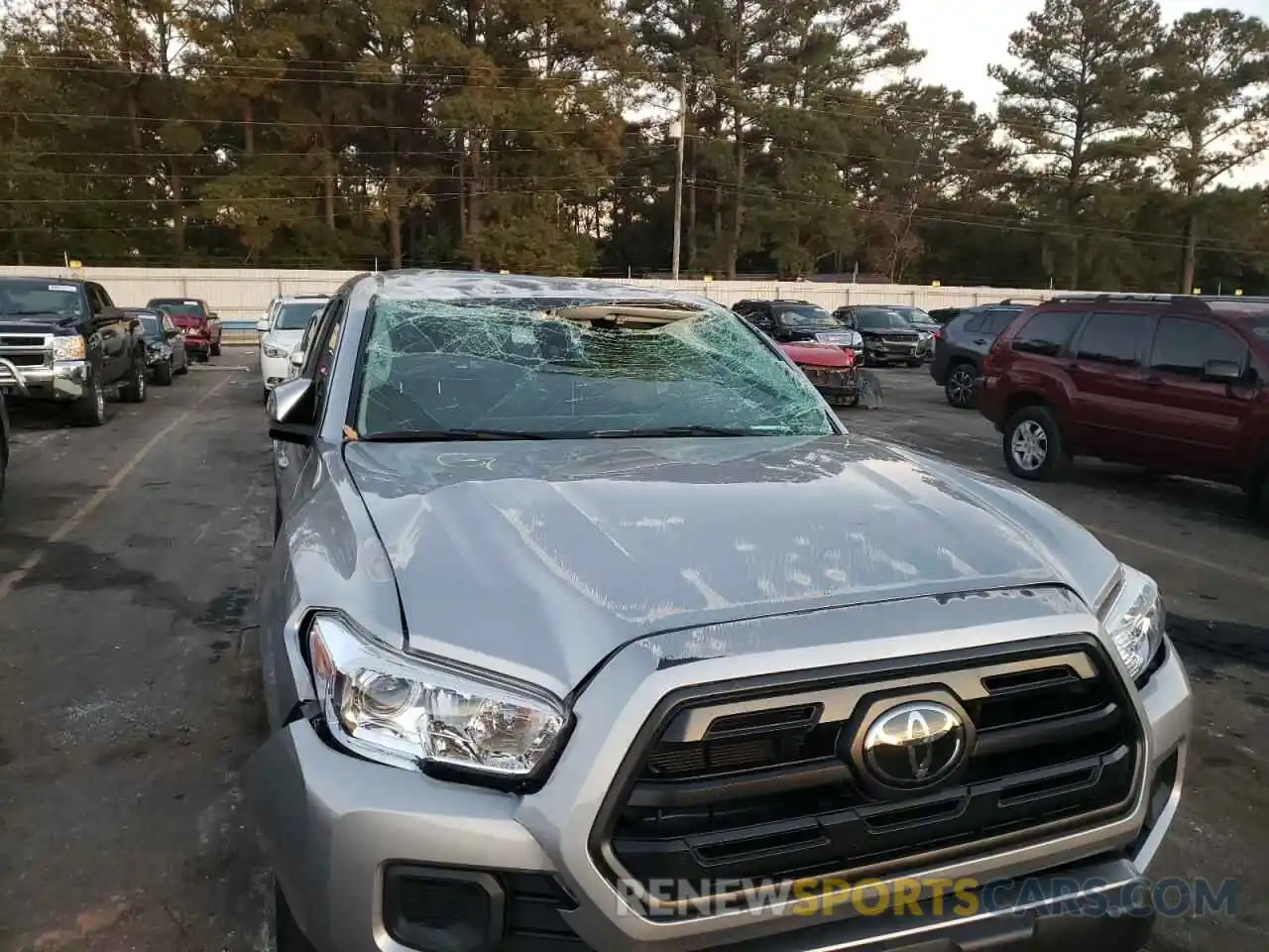 9 Photograph of a damaged car 5TFAX5GN9KX157793 TOYOTA TACOMA 2019