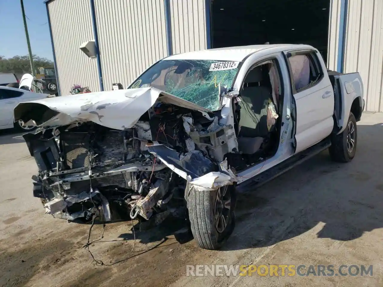 2 Photograph of a damaged car 5TFAX5GN9KX161150 TOYOTA TACOMA 2019