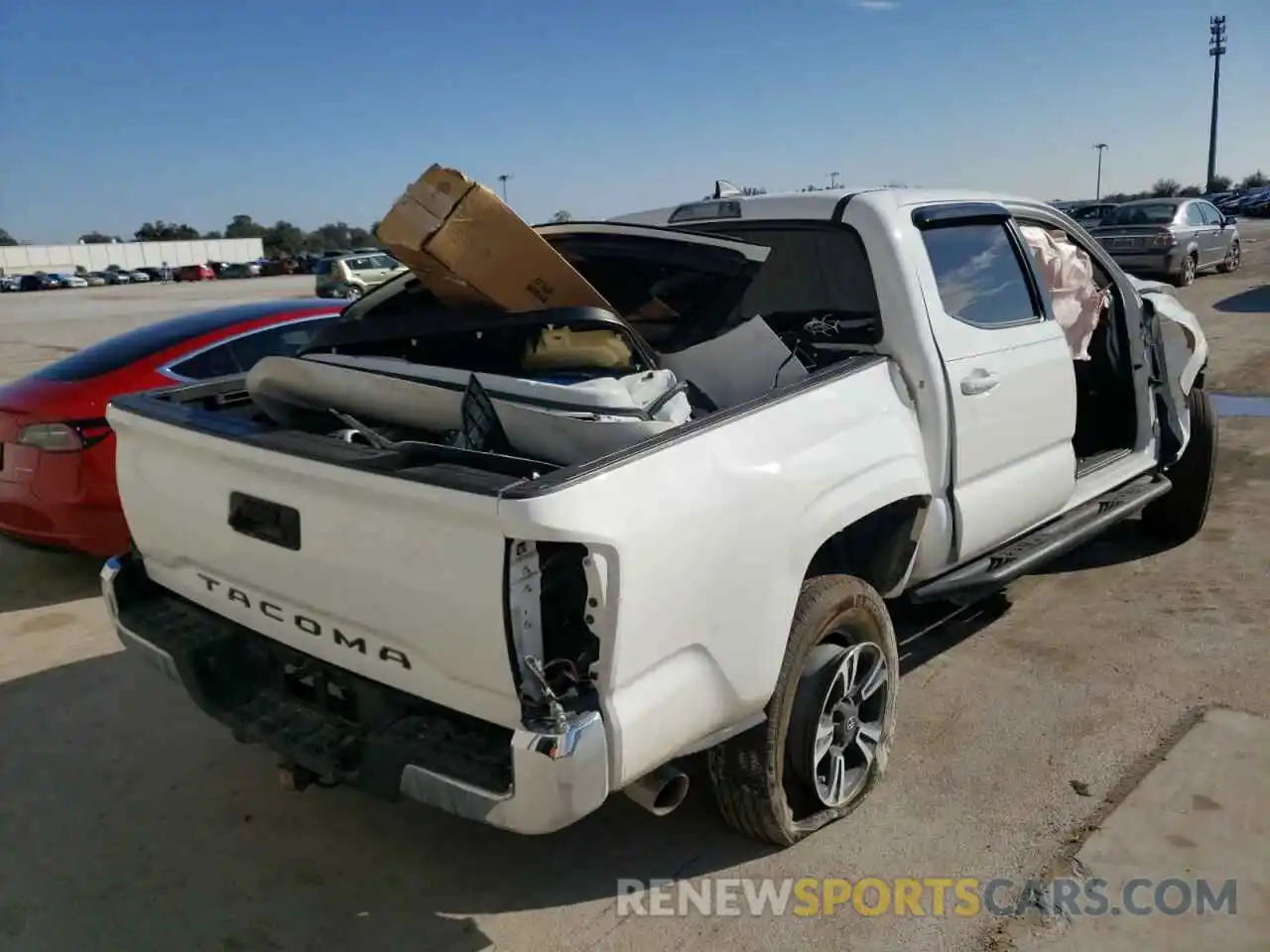 4 Photograph of a damaged car 5TFAX5GN9KX161150 TOYOTA TACOMA 2019