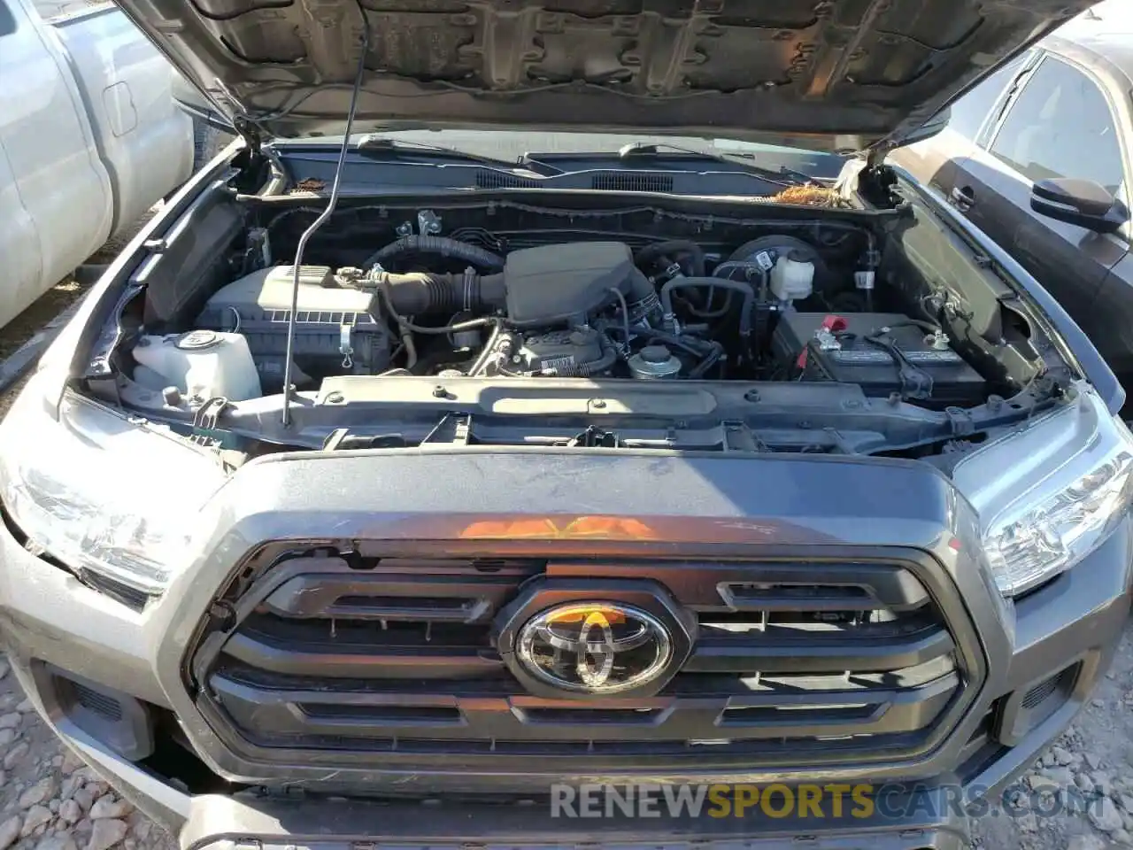 7 Photograph of a damaged car 5TFAX5GN9KX162718 TOYOTA TACOMA 2019