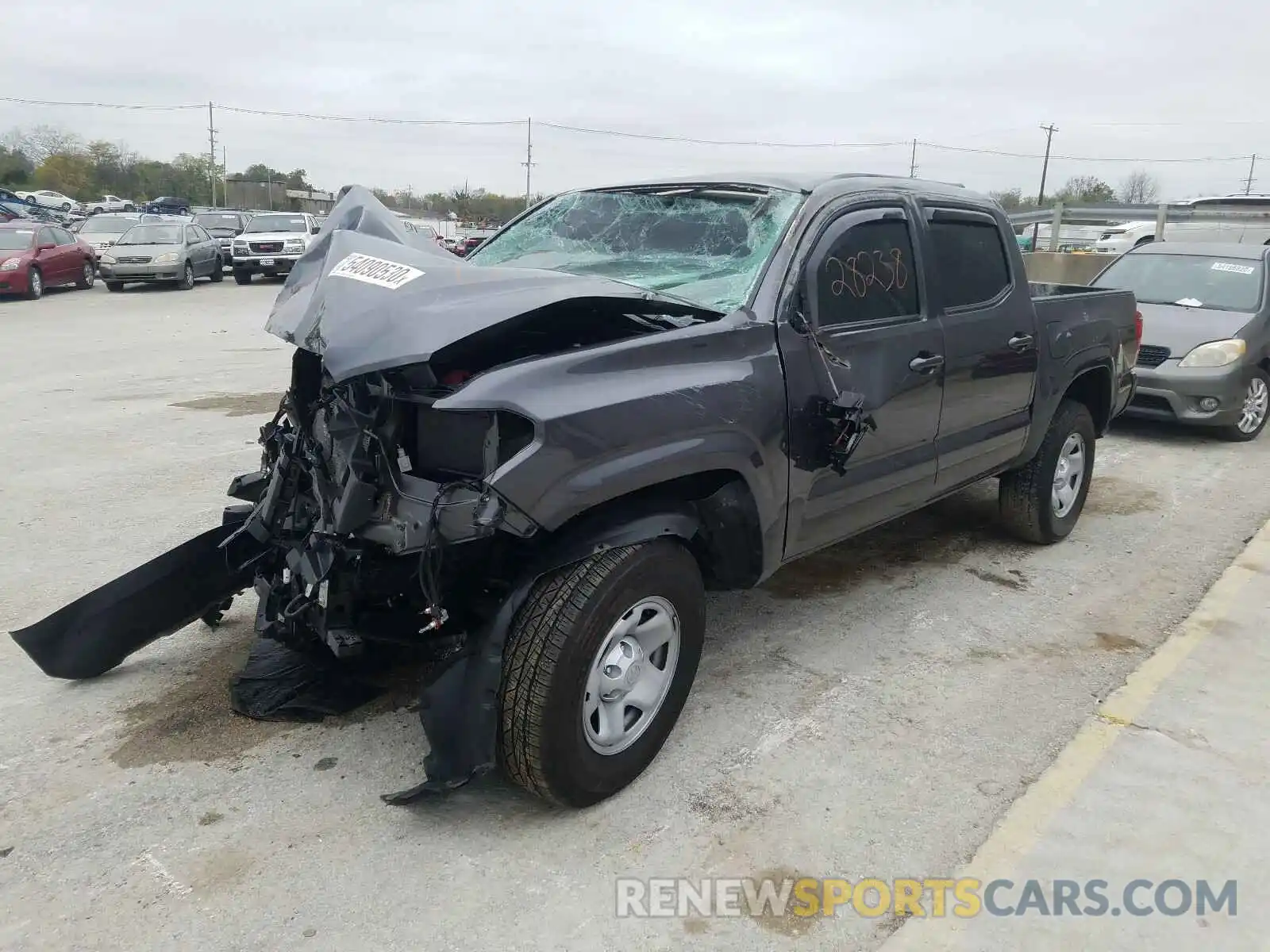 2 Photograph of a damaged car 5TFAX5GN9KX164680 TOYOTA TACOMA 2019