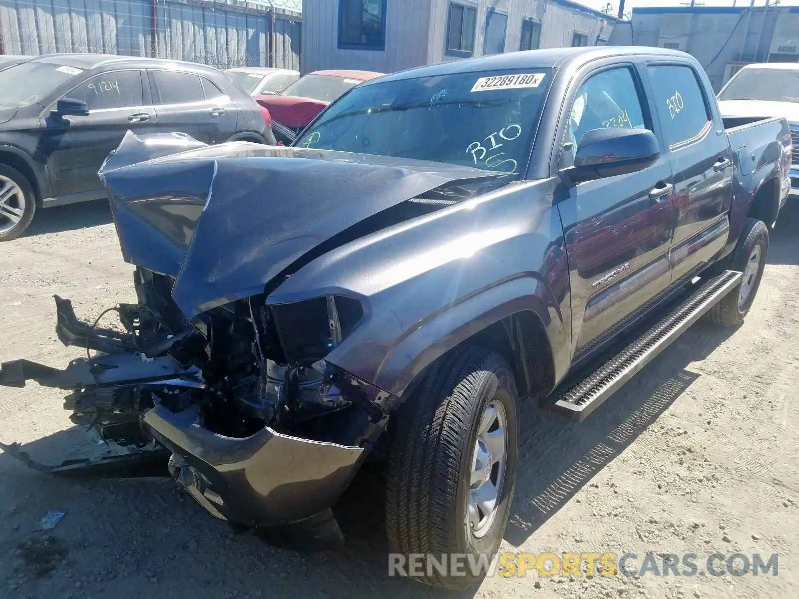 2 Photograph of a damaged car 5TFAX5GN9KX164775 TOYOTA TACOMA 2019