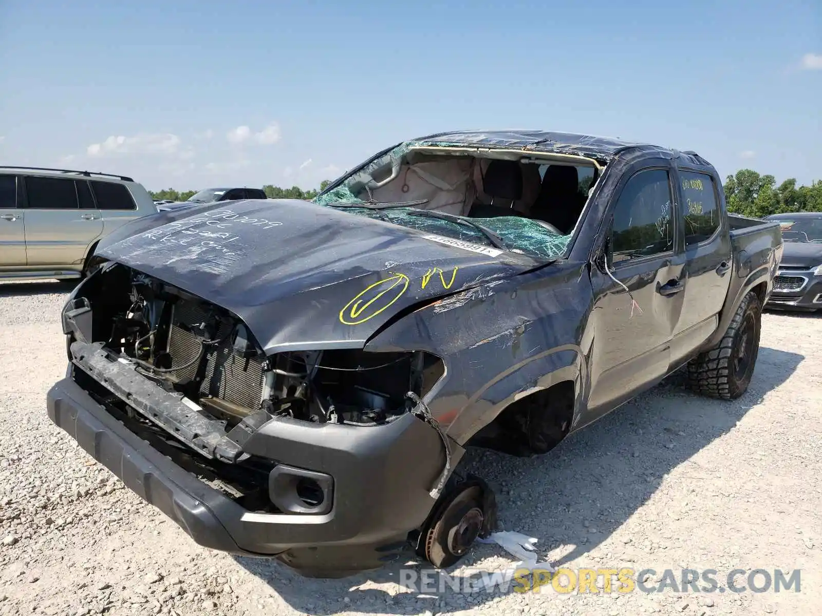 2 Photograph of a damaged car 5TFAX5GNXKX137049 TOYOTA TACOMA 2019