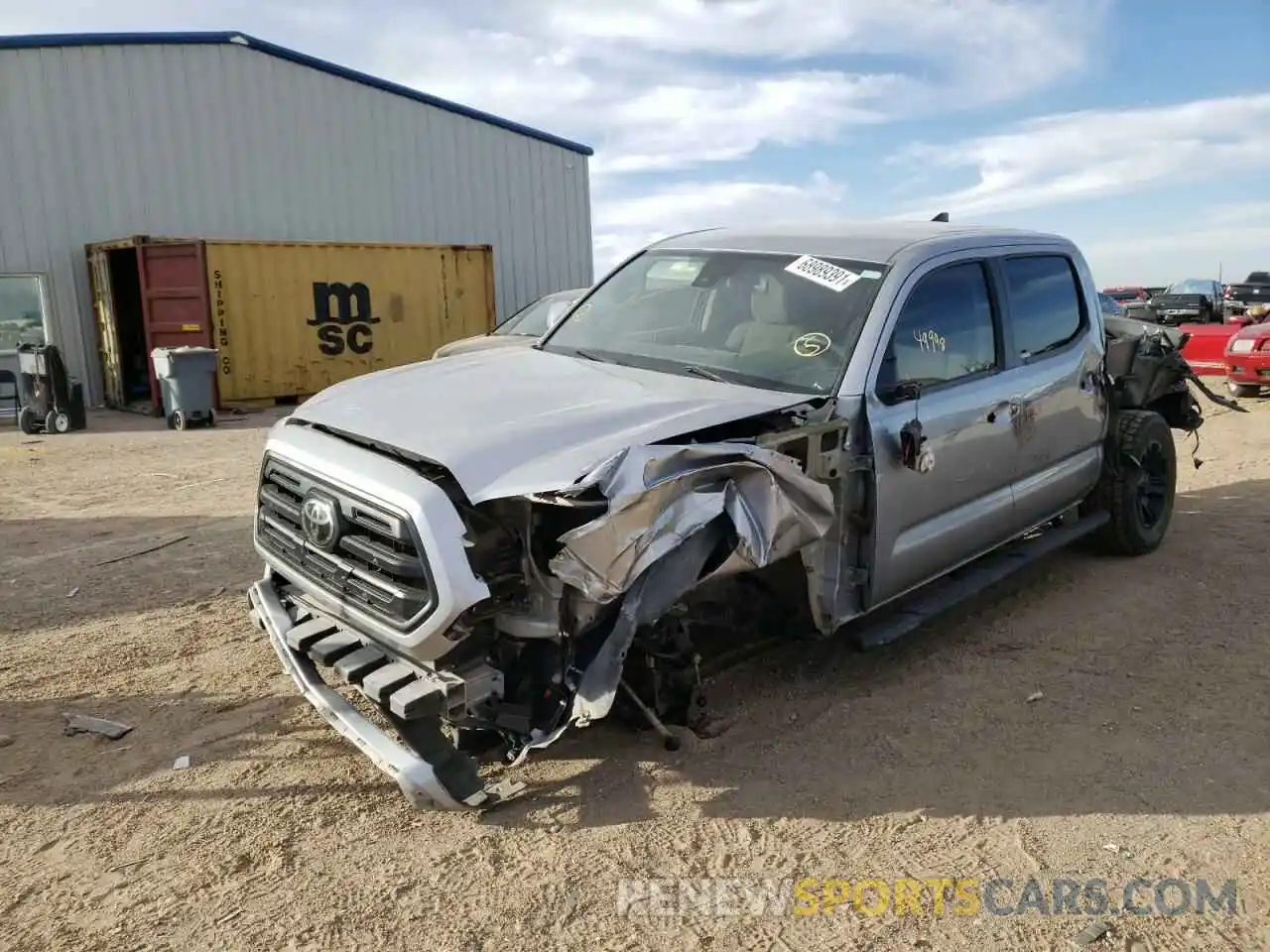 2 Photograph of a damaged car 5TFAX5GNXKX138816 TOYOTA TACOMA 2019